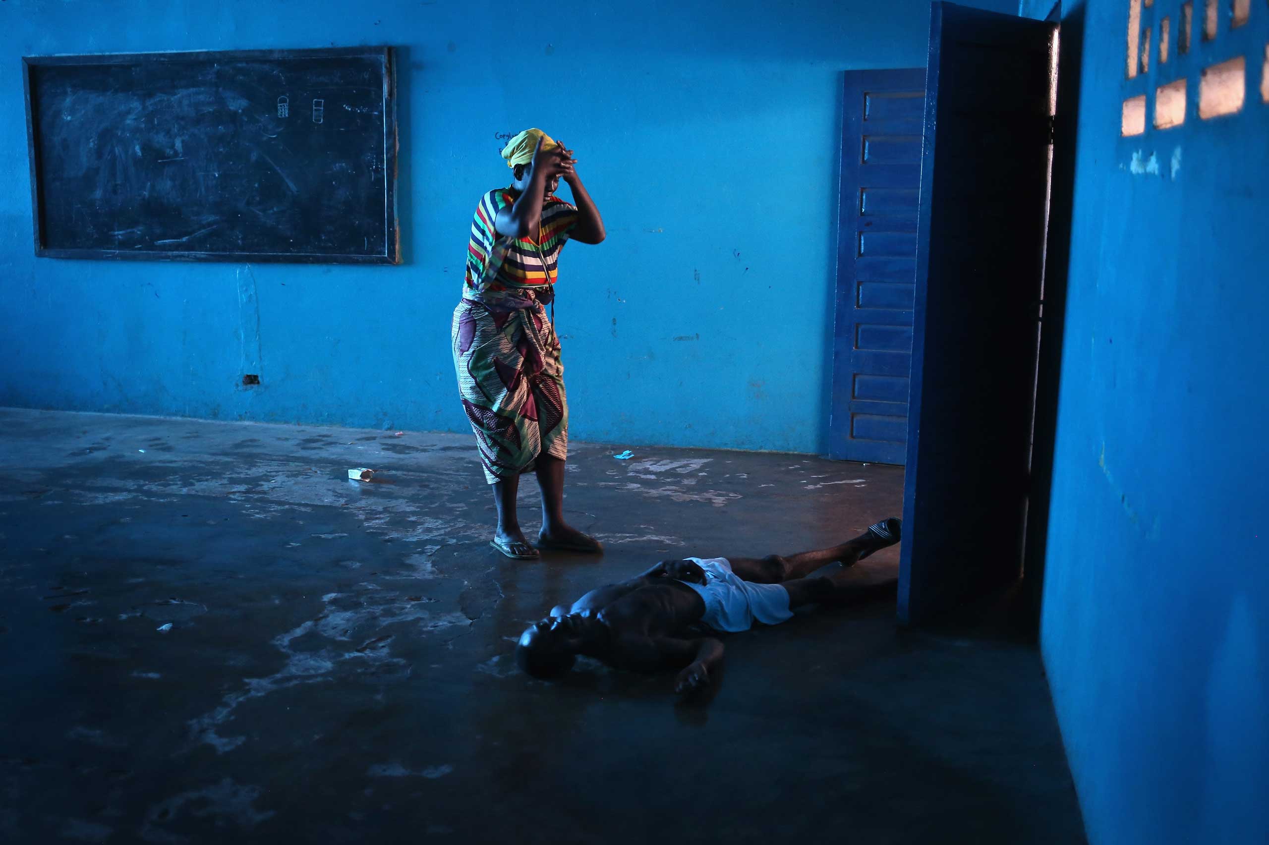 The Story Behind Some of the Most Harrowing Photos of Ebola's Spread