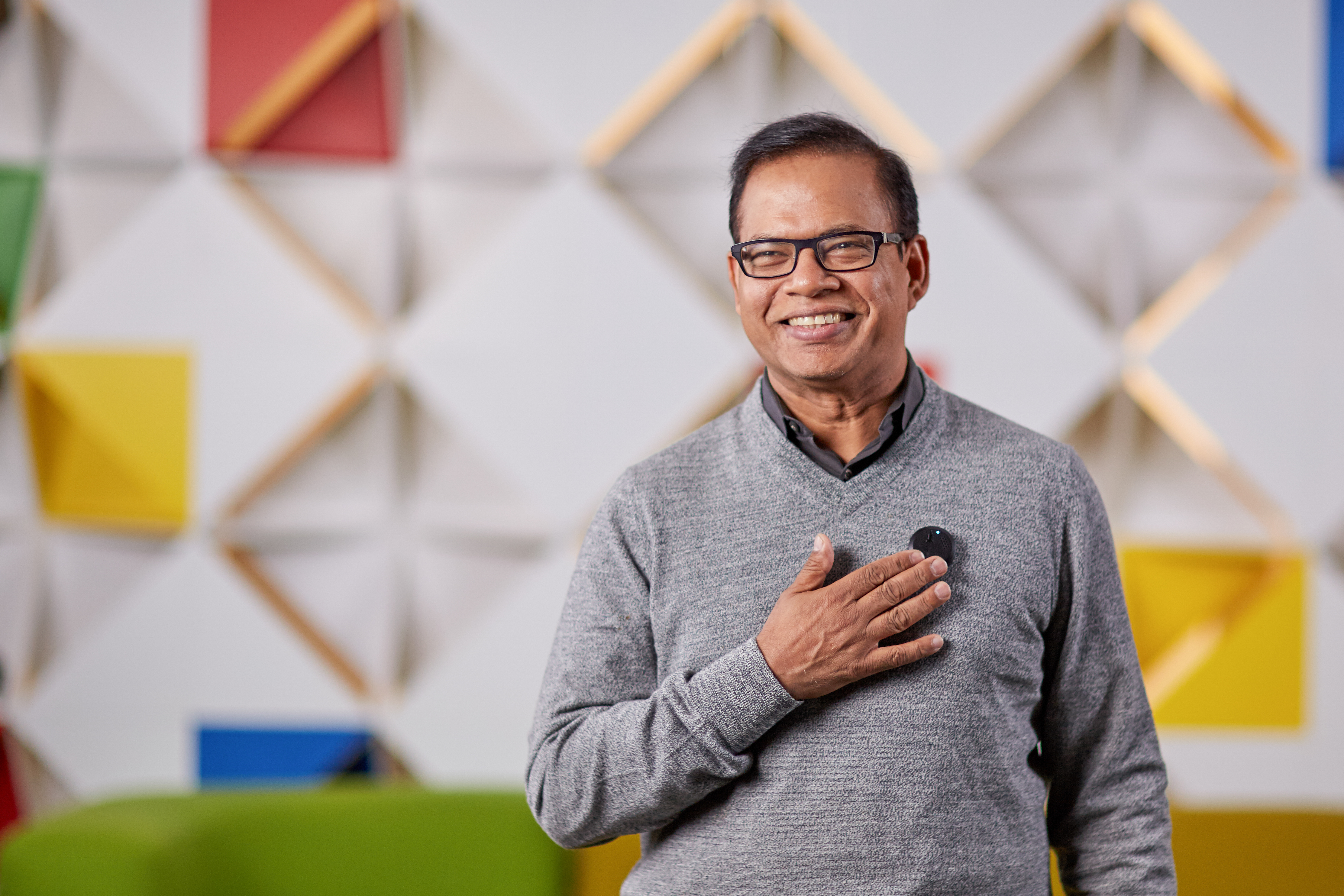 Amit Singhal, senior vice president and software engineer at Google, uses a prototype lapel pin modeled after the communicator badge from Star Trek. The device, which never left the testing phase, uses a microphone to listen to a user's voice and can use Bluetooth to send those commands to another device. 