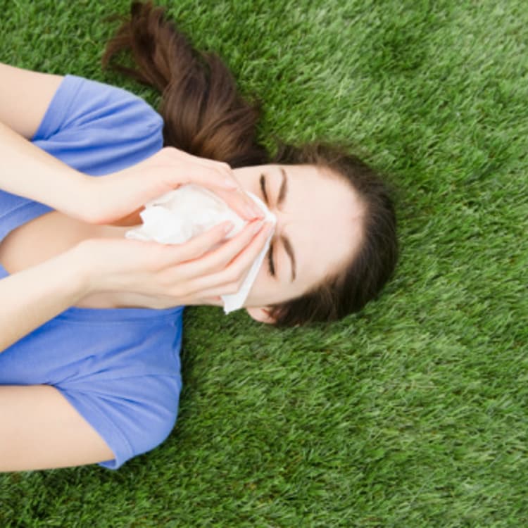 woman-blowing-nose