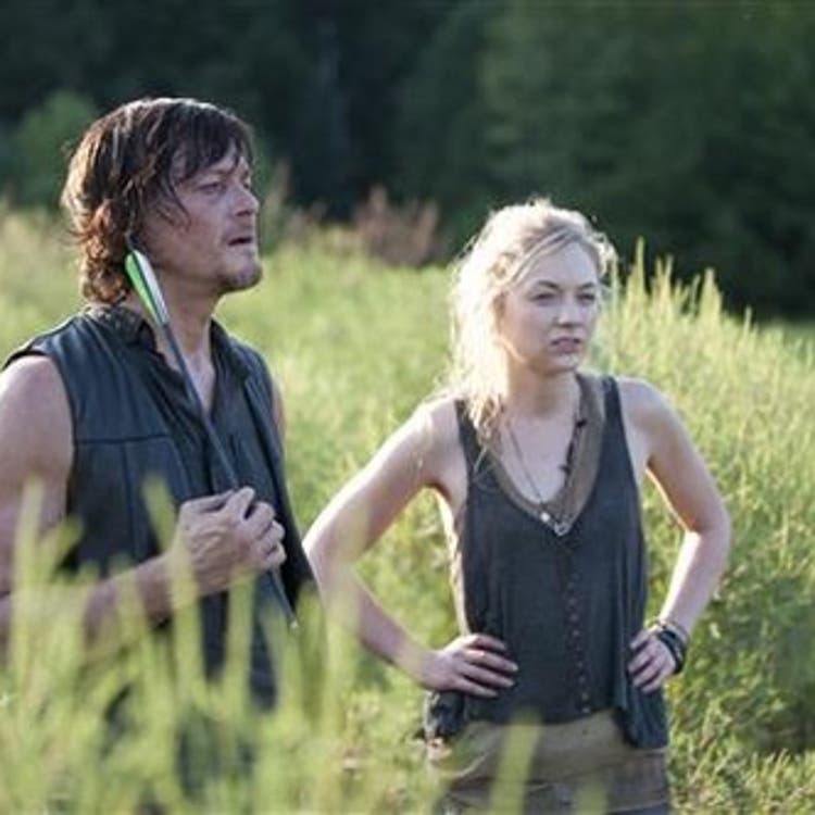 Daryl Dixon (Norman Reedus) and Beth Greene (Emily Kinney) in AMC's The Walking Dead.