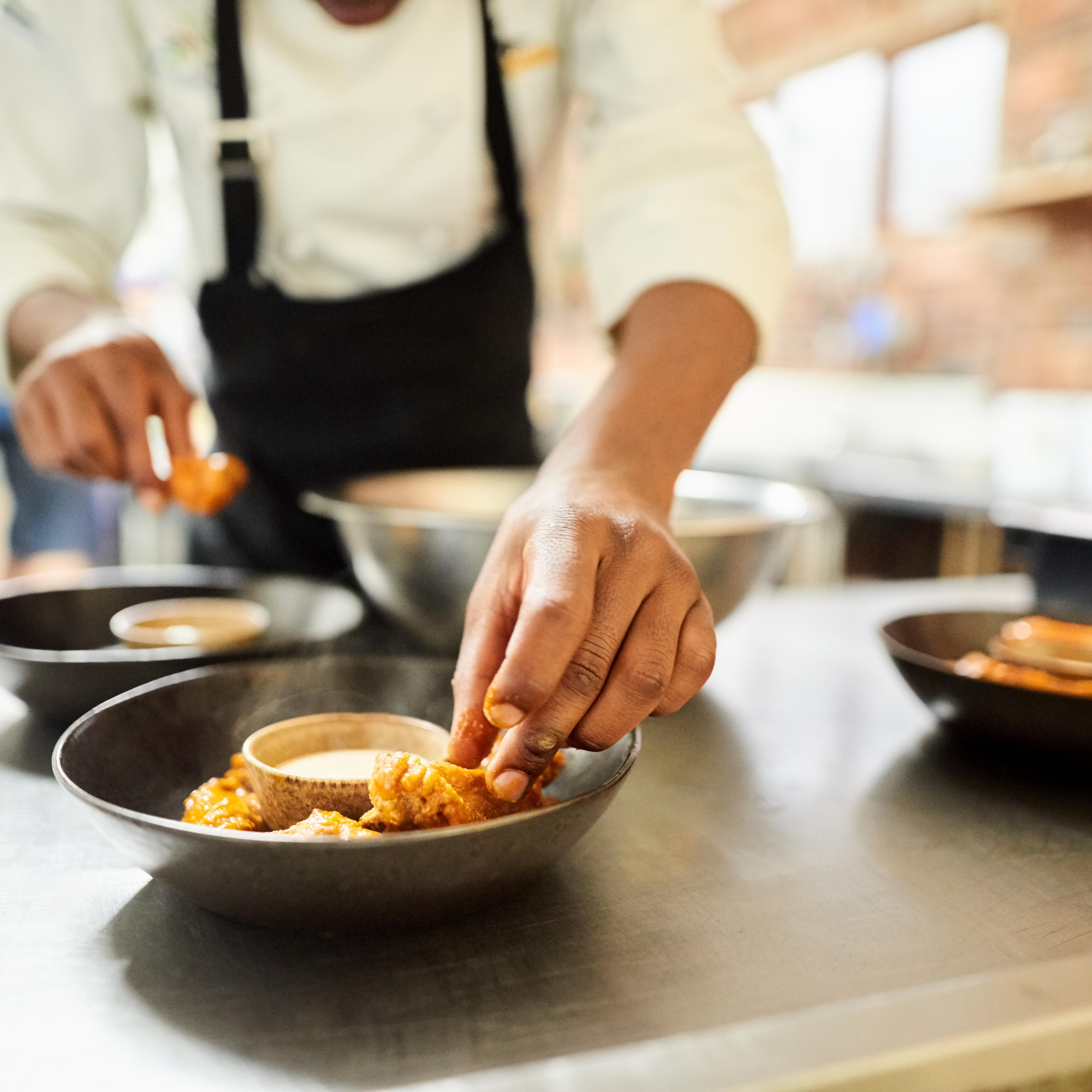 restaurant-worker-handling-food
