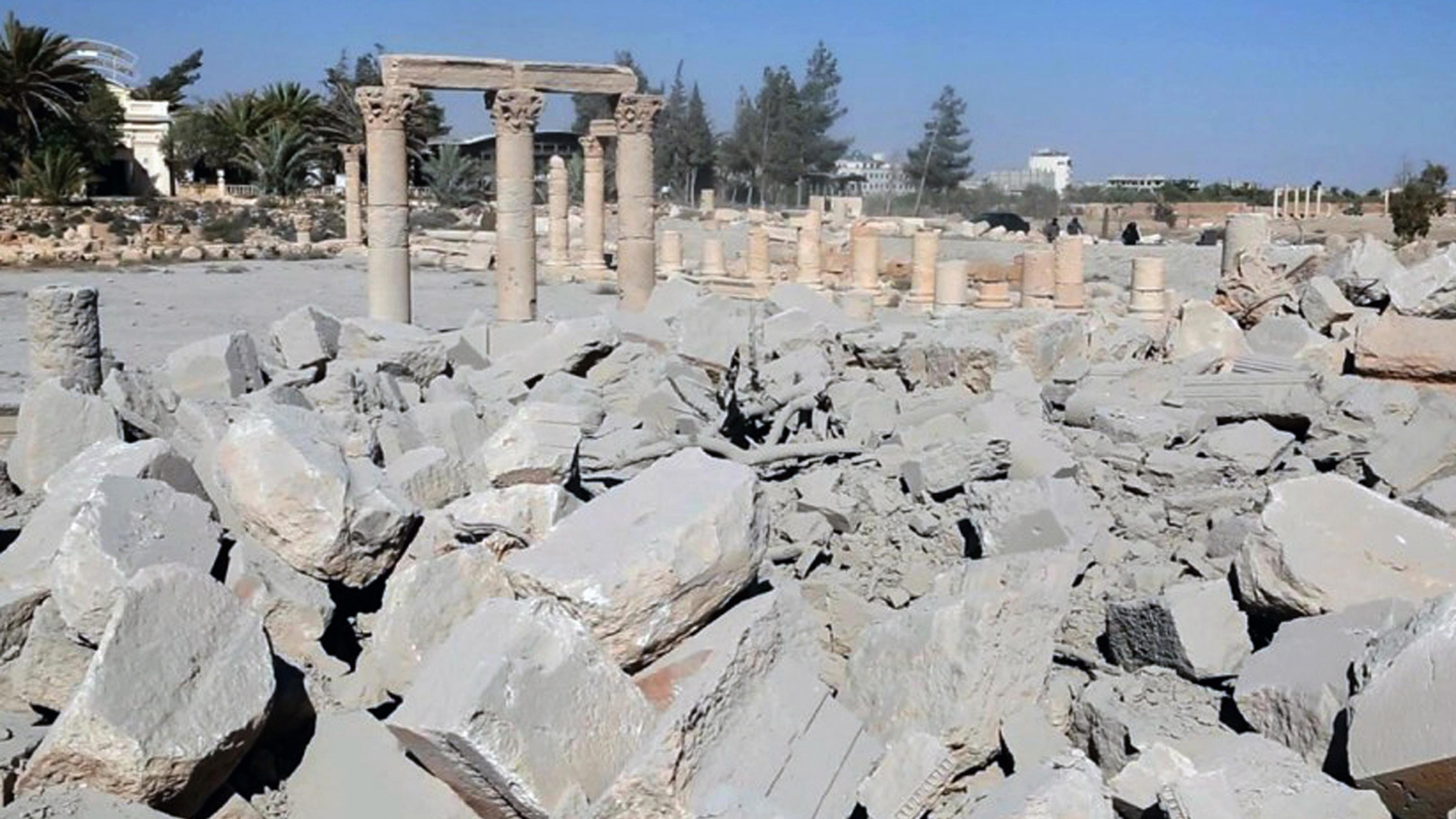 This undated photo released Tuesday, Aug. 25, 2015 on a social media site used by Islamic State militants, which has been verified and is consistent with other AP reporting, shows the demolished 2,000-year-old temple of Baalshamin in Syria's ancient cara