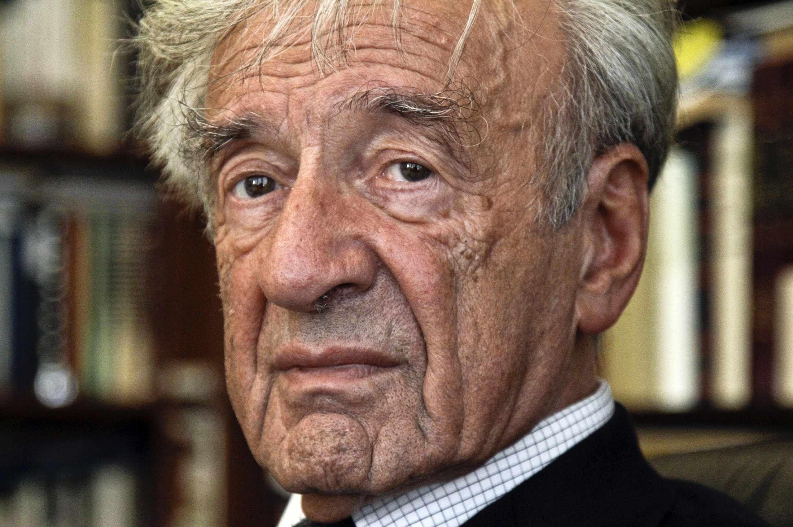 This Sept. 12, 2012, photo shows Holocaust activist and Nobel Peace Prize recipient Elie Wiesel, 83, in his office in New York.