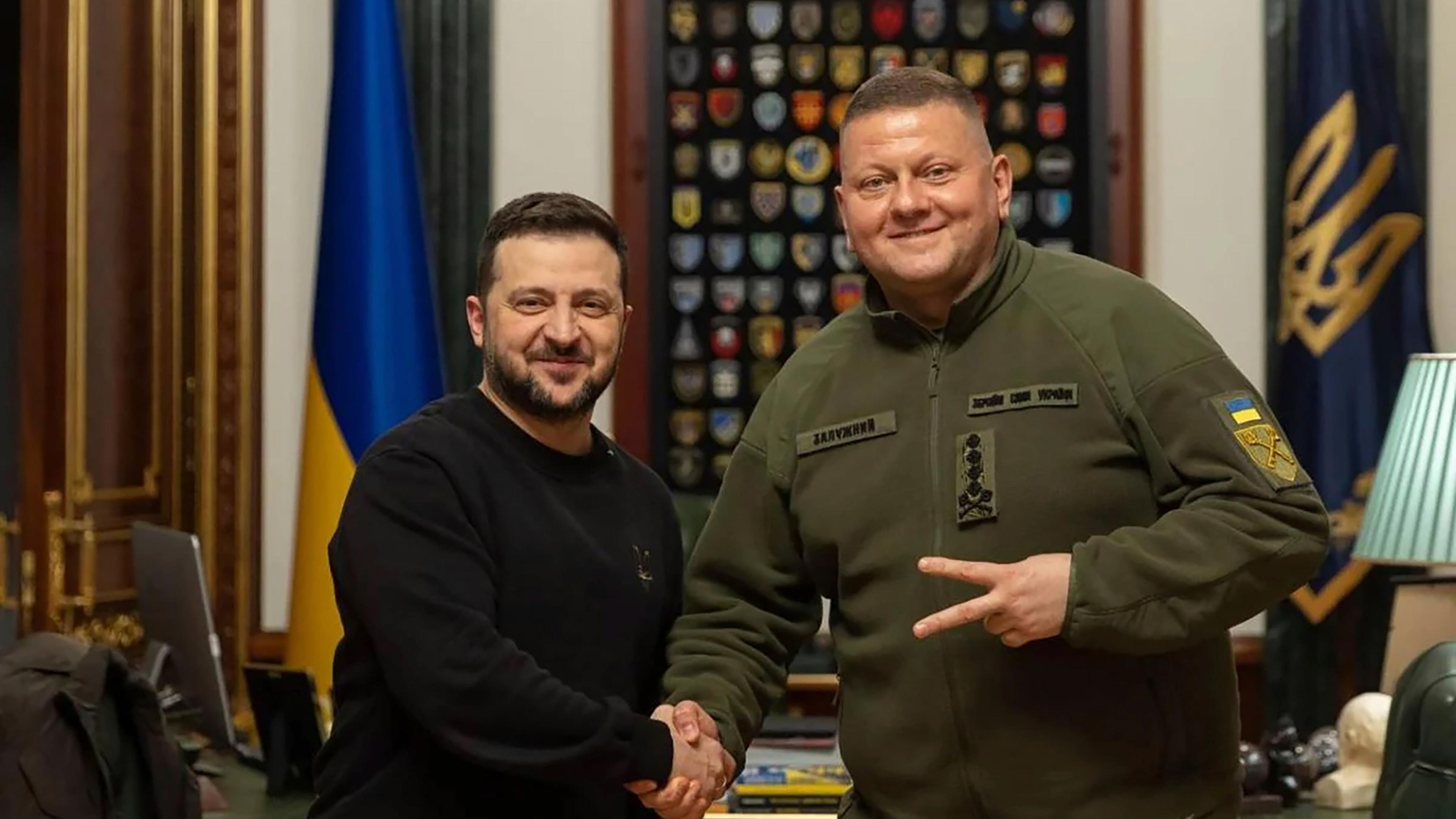 In this photo provided by the Ukrainian Presidential Press Office, Ukrainian President Zelensky, left, shakes hand with Commander-in-Chief of Ukraine's Armed Forces Valerii Zaluzhnyi during their meeting in Kyiv, Ukraine, Thursday, Feb. 8, 2024.