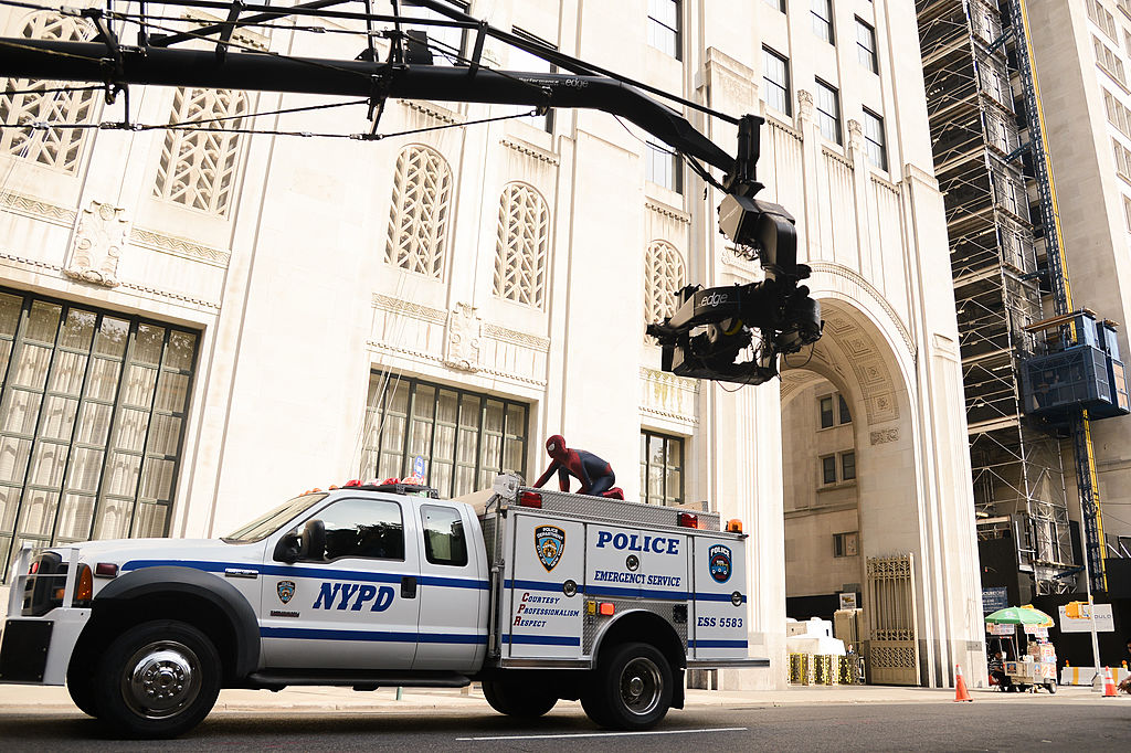 Actor Andrew Garfield films a scene at "The Amazing Spiderman 2" movie set in Madison Square Park on June 22, 2013 in New York City.