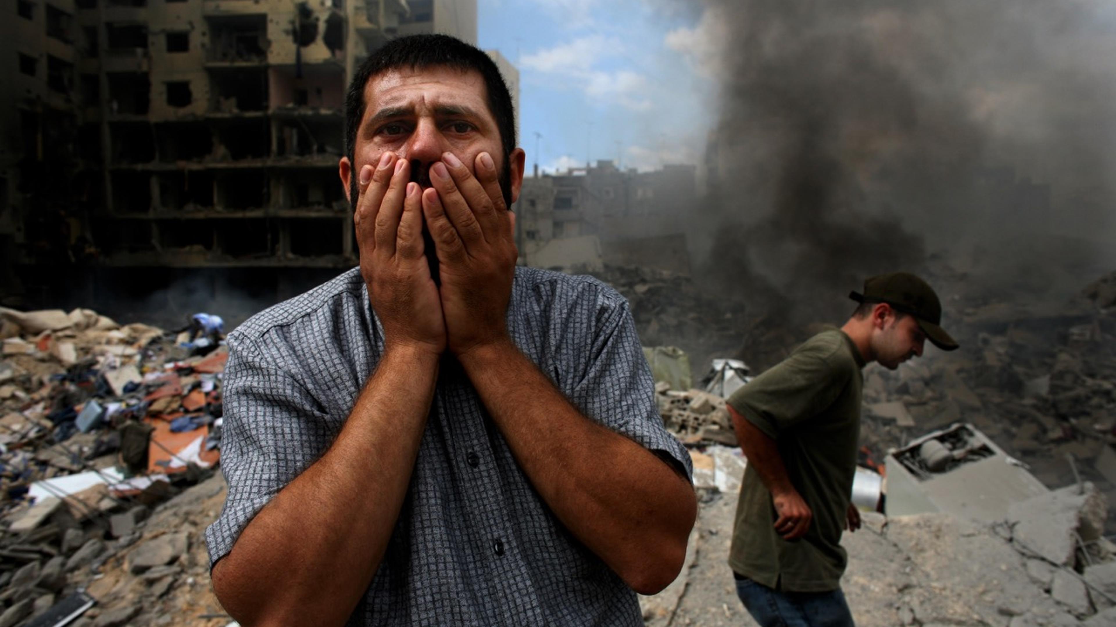 I took this picture 5-10 minutes after the bombing in a neighborhood in southern Beirut because I had been taking pictures there. I got to the sight immediately with the Red Cross and there was nothing to be found. It was August 13, at the very end of th