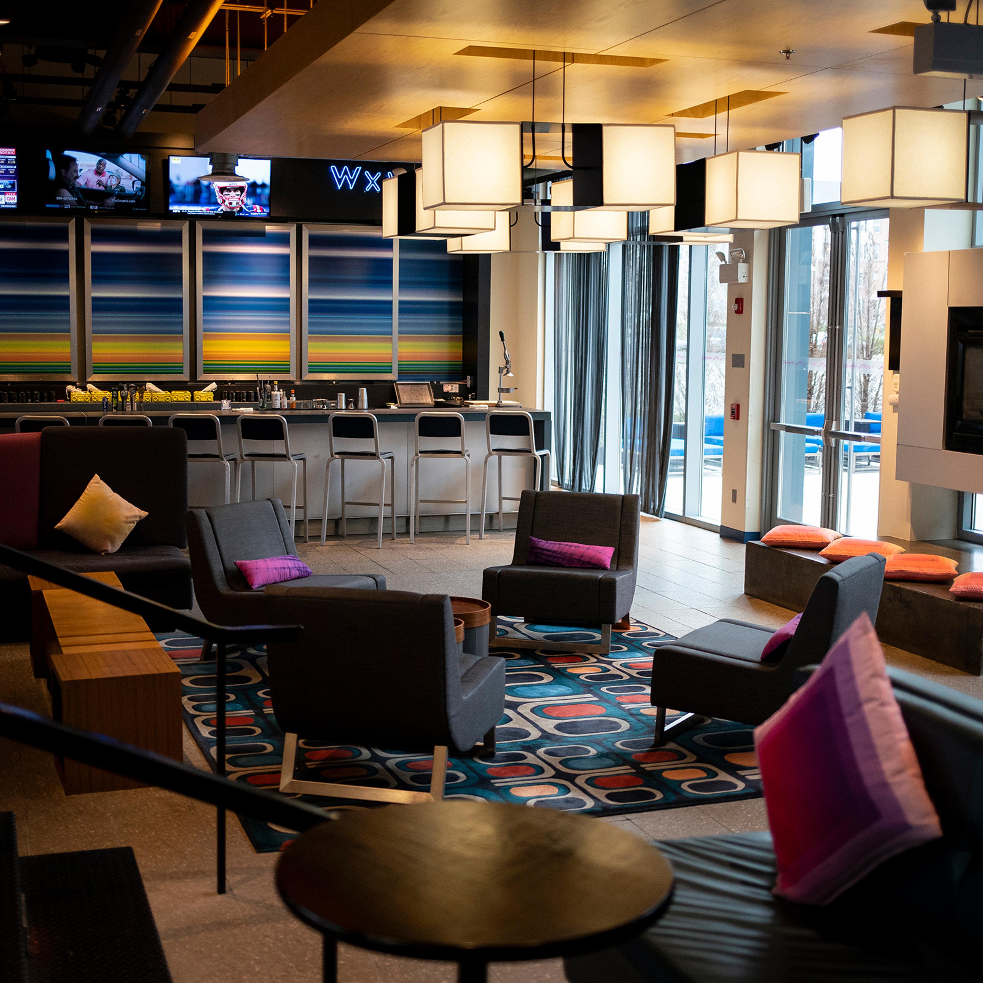 An empty lobby at the Aloft Dulles Airport North Hotel in Ashburn, Va., on March 24, 2020.