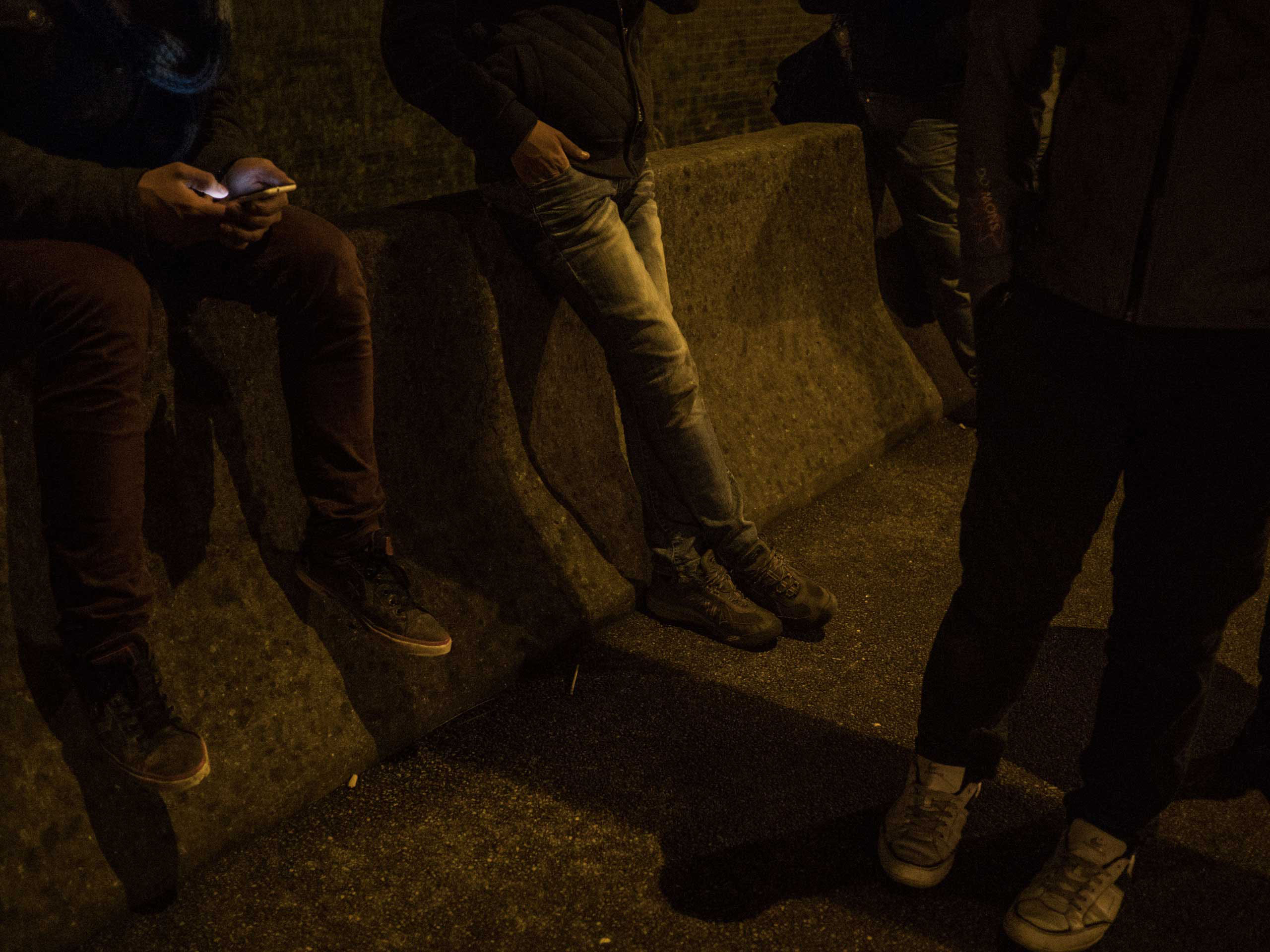 Syrian migrants who have been living in the "jungle", the shantytown near Calais city, France. They hope to climb the fence in order to cross illegally to the Untied Kingdom, Sept. 17, 2015.