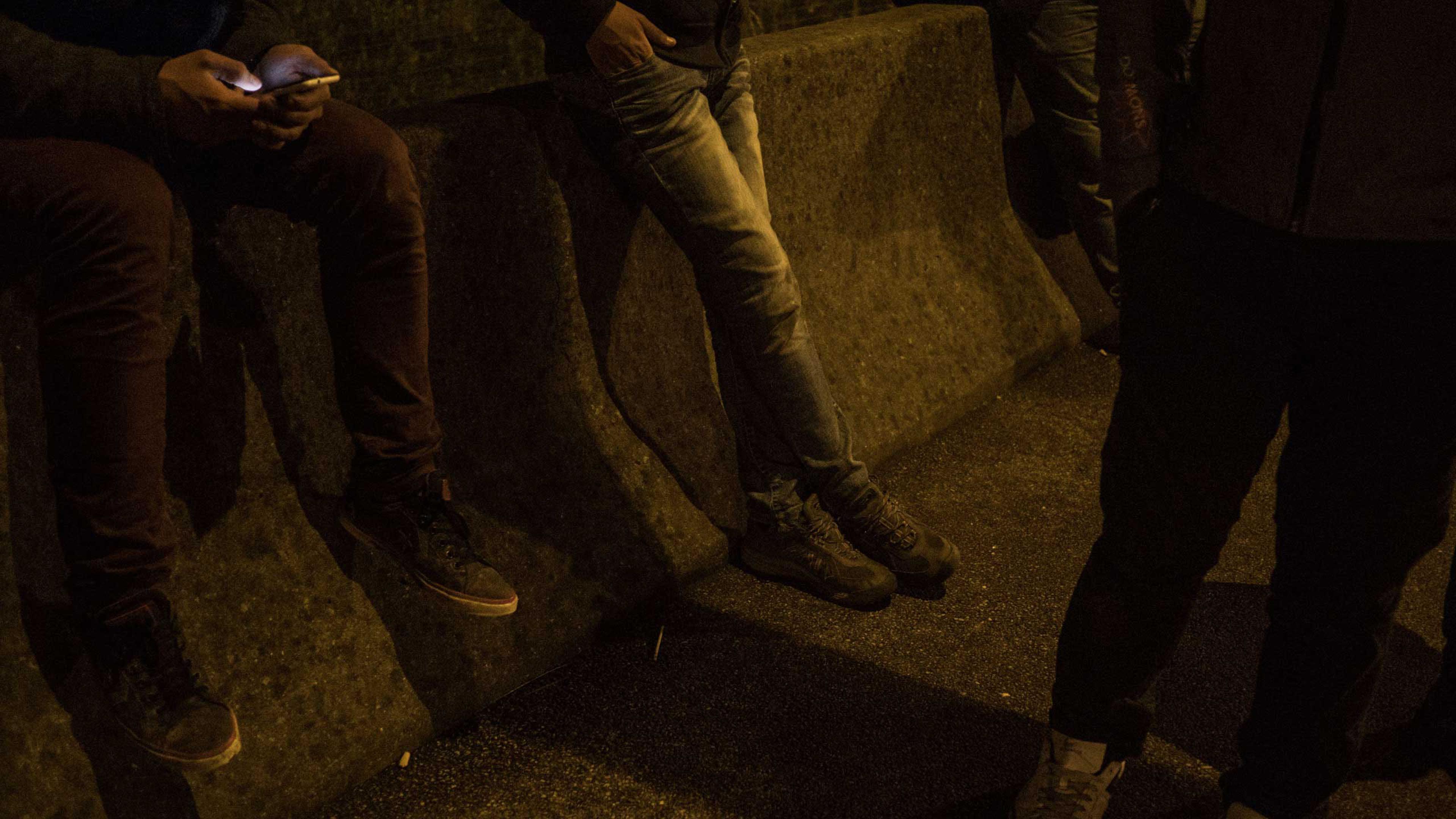 Syrian migrants who have been living in the "jungle", the shantytown near Calais city, France. They hope to climb the fence in order to cross illegally to the Untied Kingdom, Sept. 17, 2015.