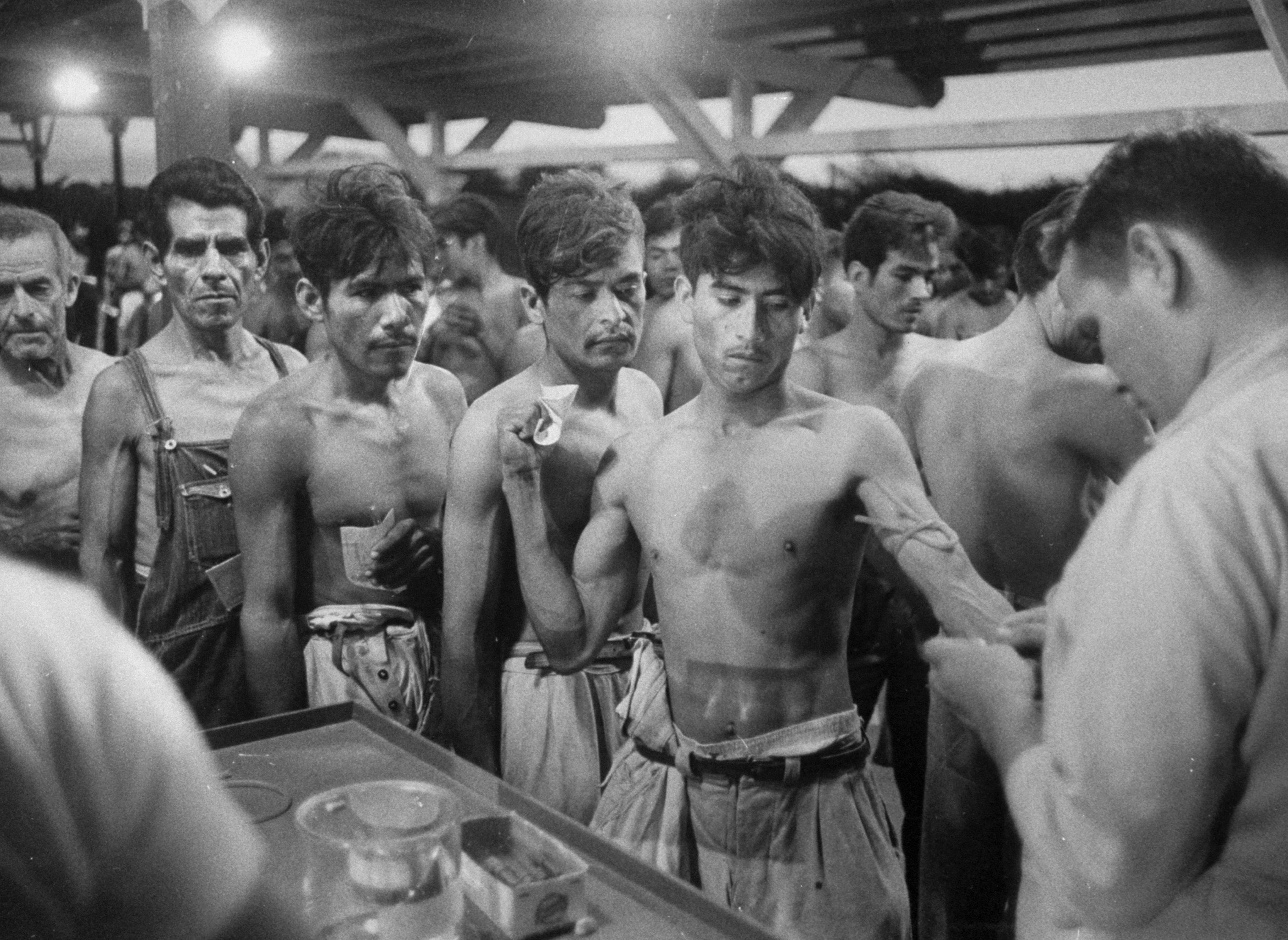 Braceros examined at reception center at Hidalgo, Texas, 1959.