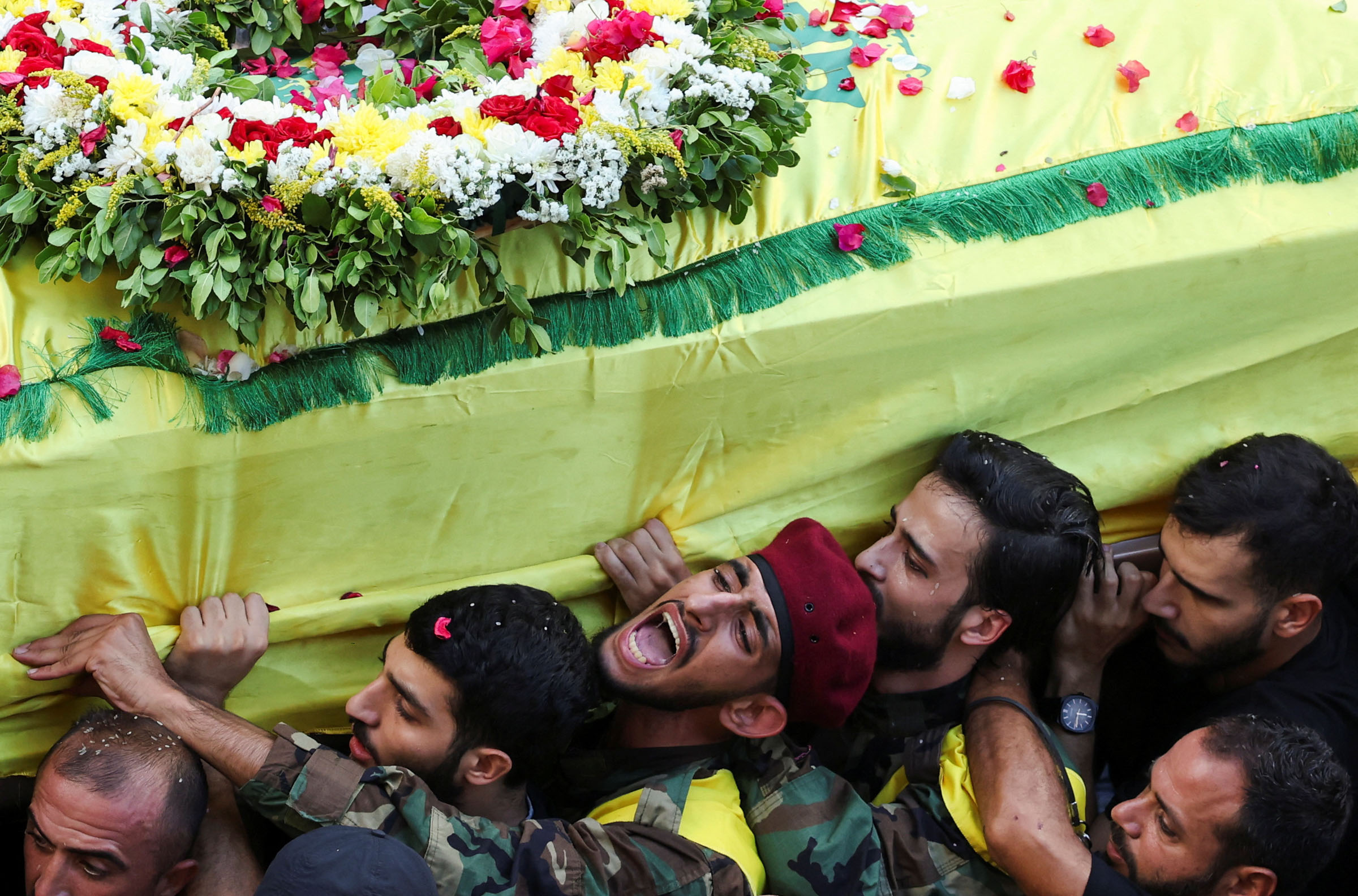 Funeral of people who were killed following pager detonations across Lebanon on Tuesday, in Beirut suburbs