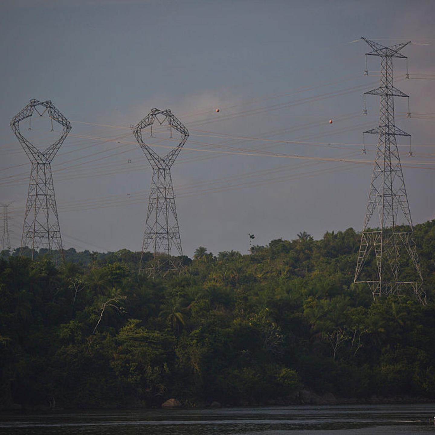 Transmission towers that connect power lines to the Belo Monte hydroelectric dam stand near the Xingu river in Para, Brazil, on Saturday, Dec. 20, 2014.
