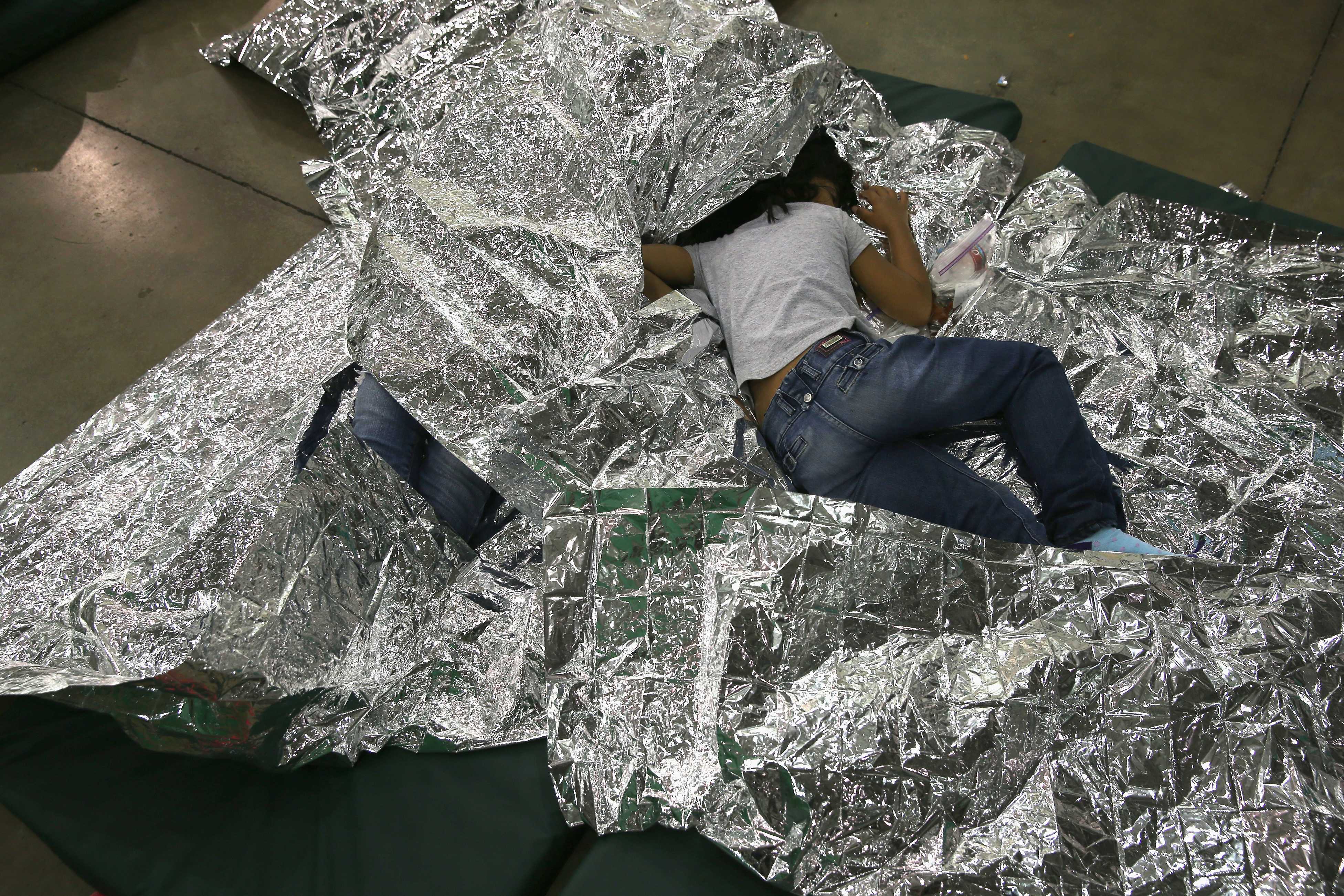 Photographer John Moore's Viral Photo of 'Zero Tolerance' Photographer John Moore's Viral Photo of 'Zero Tolerance'