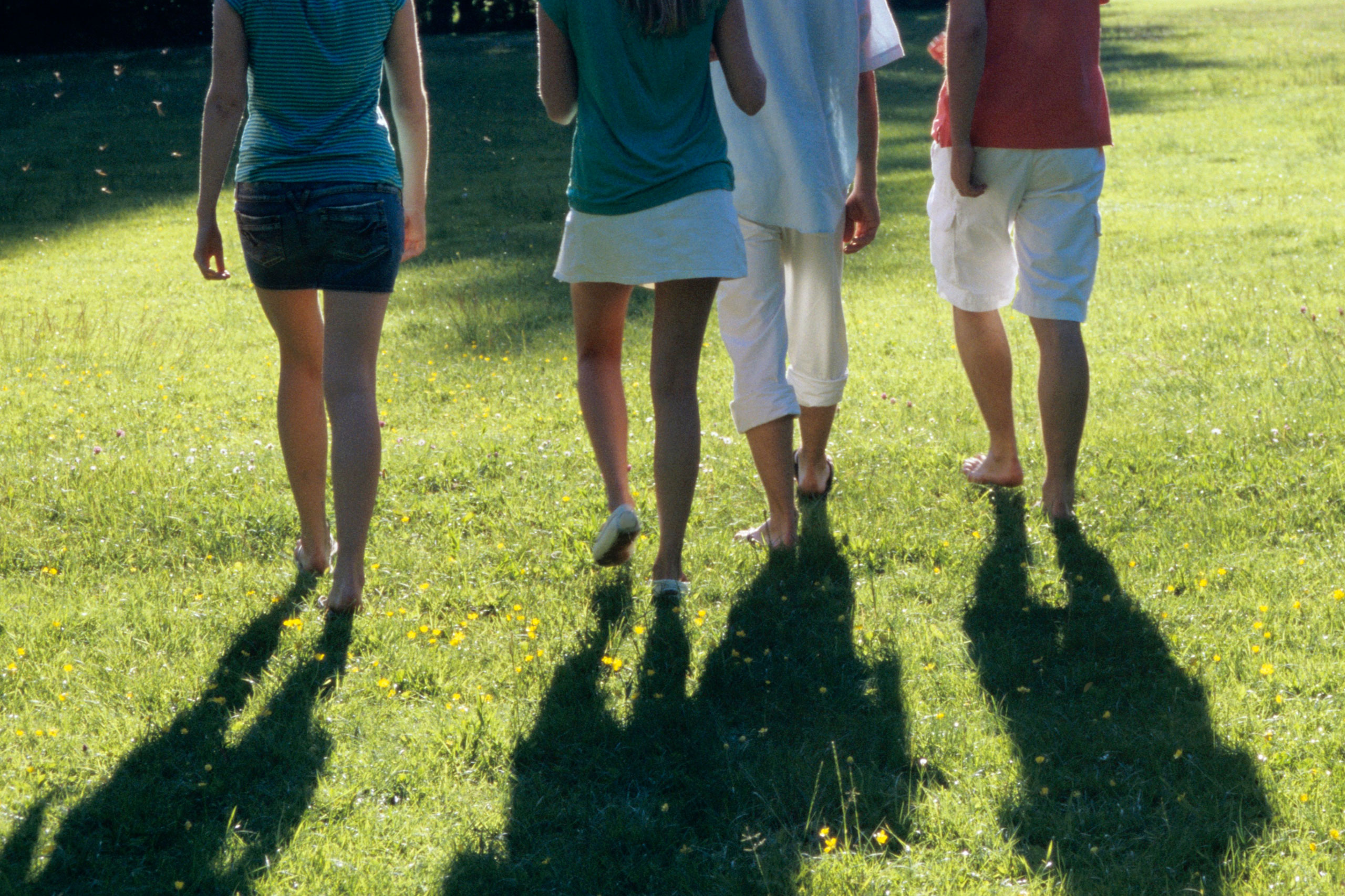 Group of people walking in park