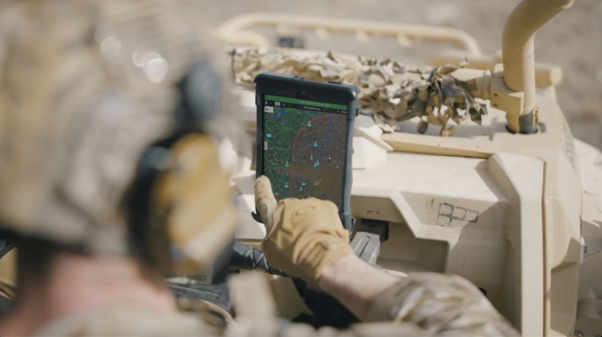 A soldier uses Palantir technology for battlespace awareness & planning.