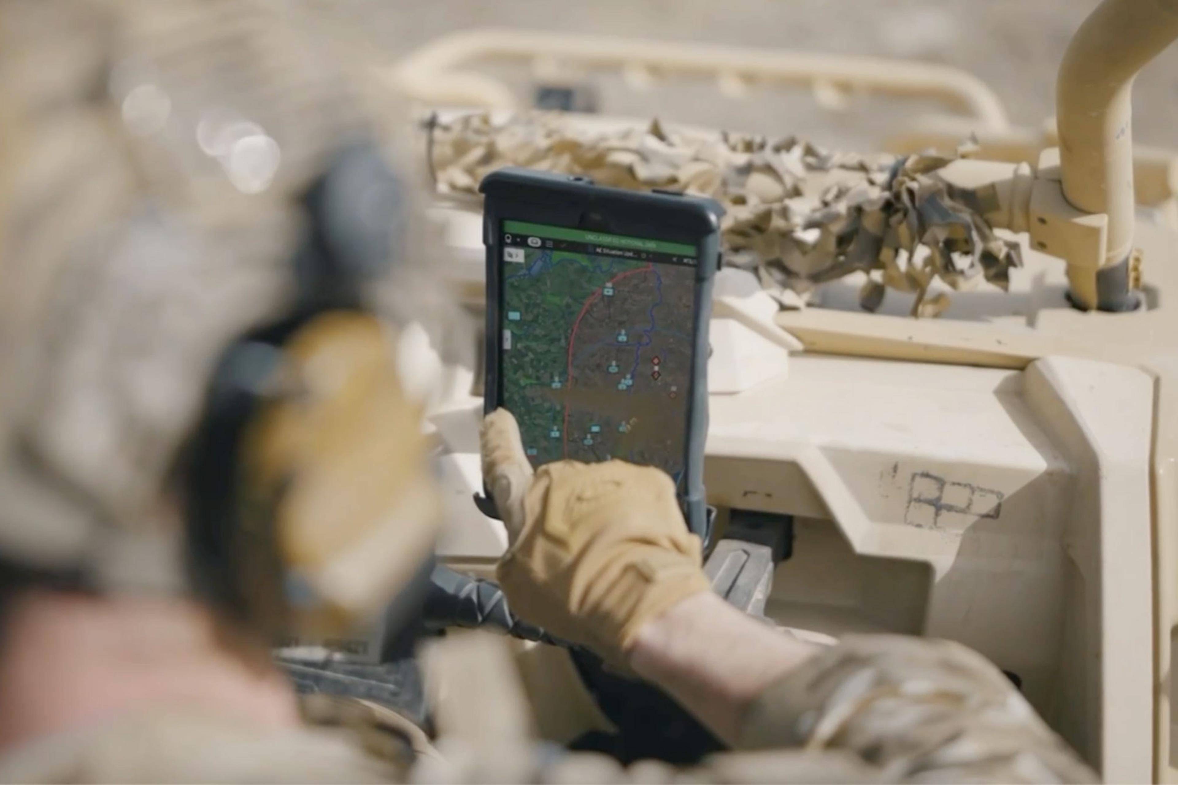 A soldier uses Palantir technology for battlespace awareness & planning.