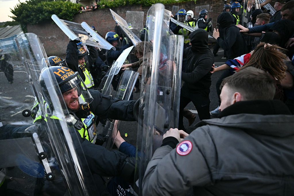 U.K. Prime Minister Condemns Violent Protests as Police Face Criticism Over Handcuffed Student&rsquo;s Murder