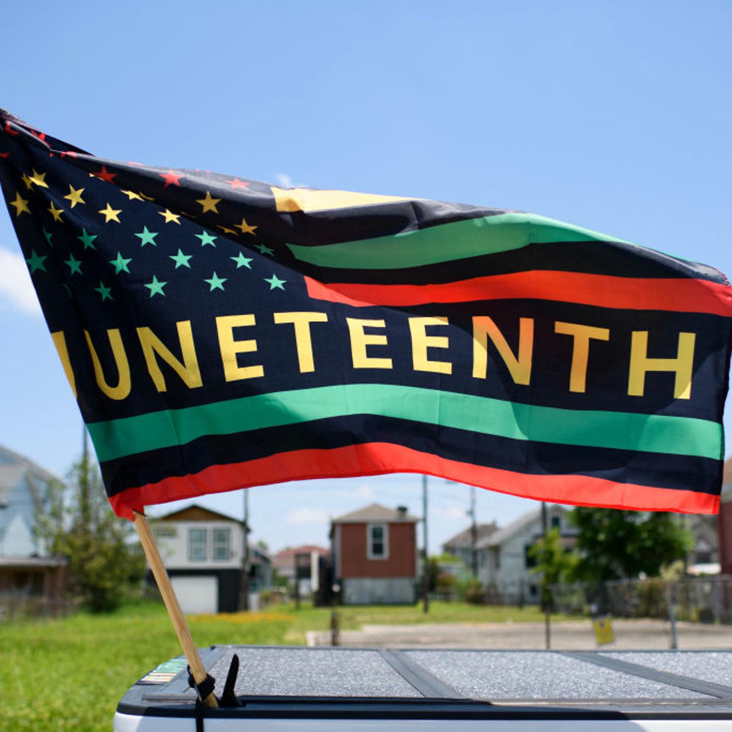 A Juneteenth flag flies on a float during the 45th annual Juneteenth National Independence Day celebrations in Galveston, Texas, on June 15, 2024.