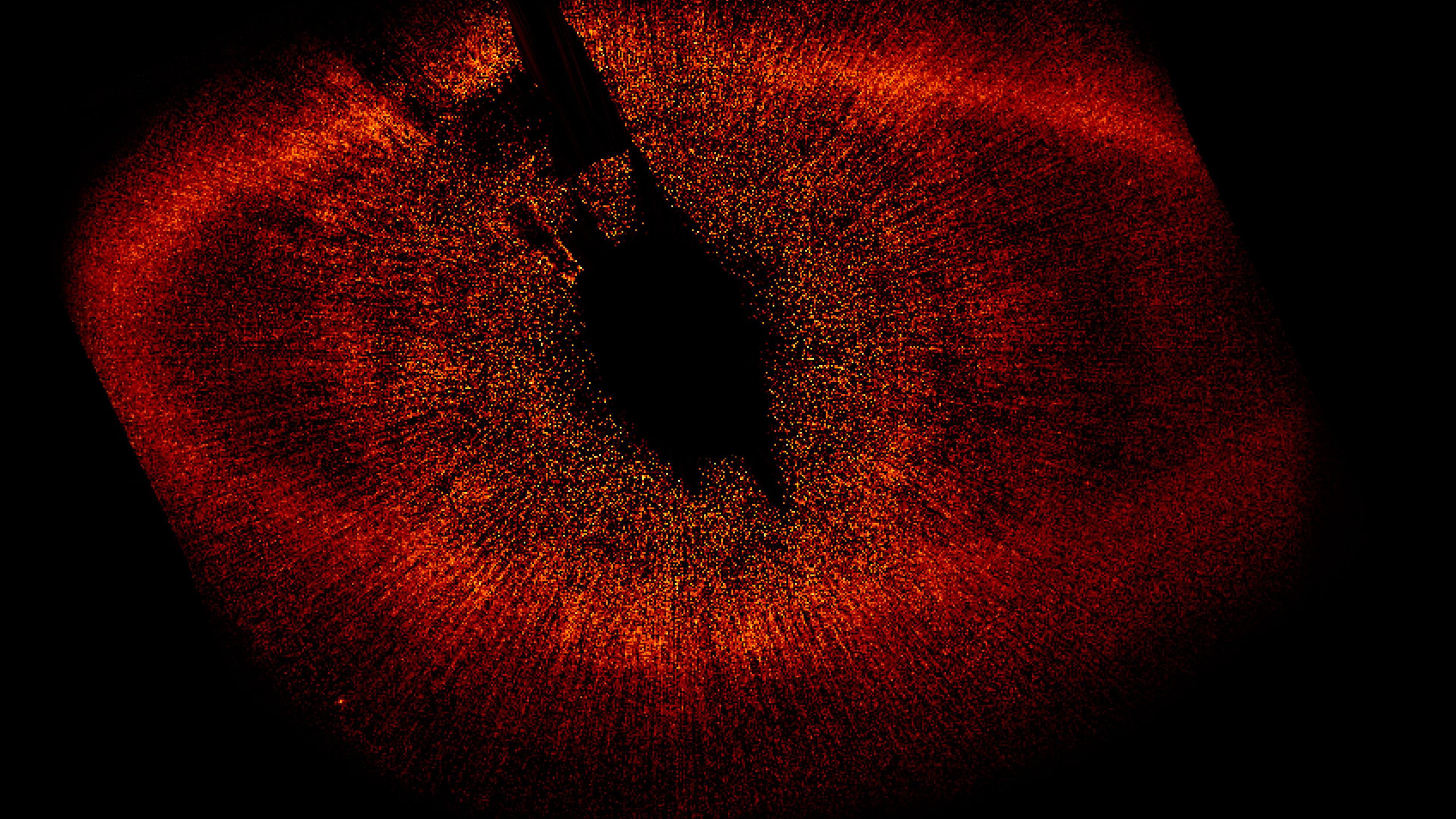 English: The large disk of gas surrounding Fomalhaut is clearly visible in this image. It is not centred on Fomalhaut quite as predicted, hinting that the gravity of another body – perhaps a planet – is pulling it out of shape.Date 13 November 2008Source