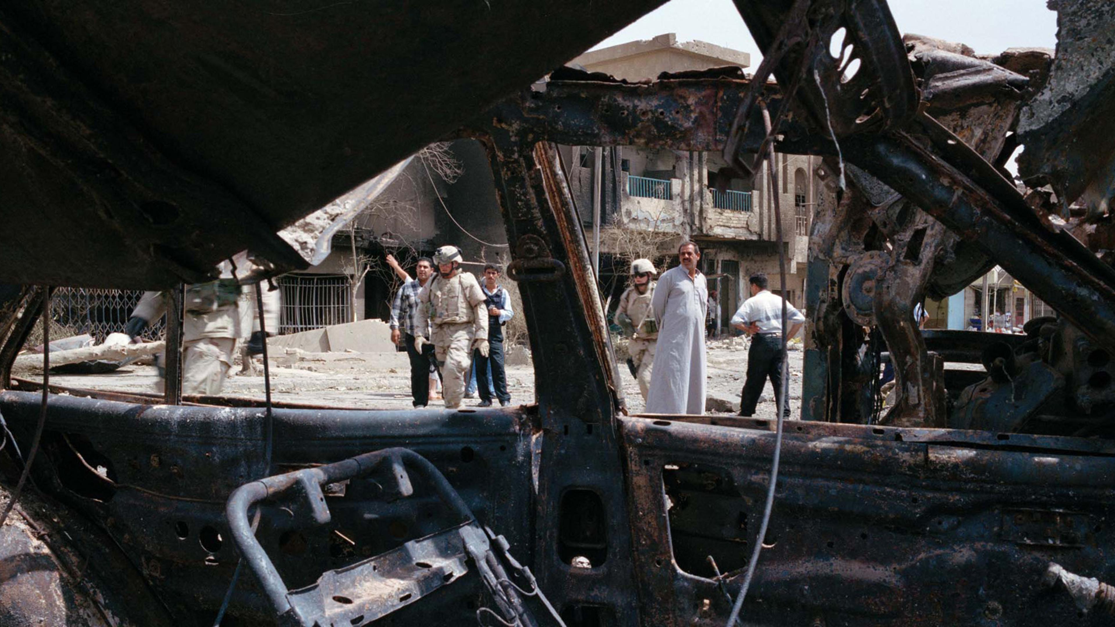 Wreckage of a suicide car bomb in Baghdad, Iraq, 2005.
