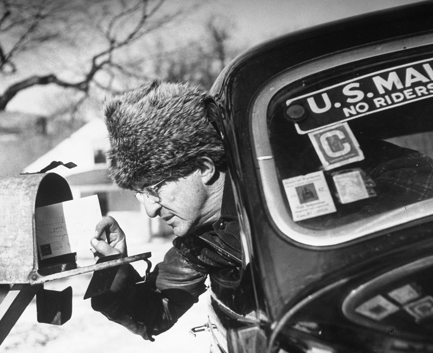 Rural Vermont mailman Mark Whalon makes rounds in sub-zero weather.