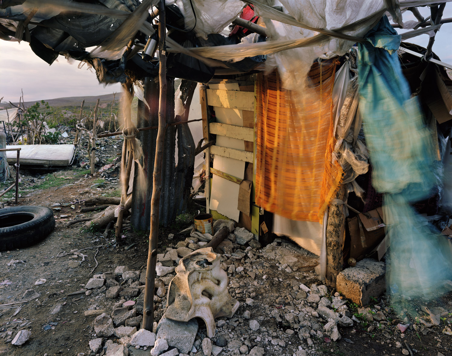Camp Obama, home to approximately 10,000 people, was named to draw U.S. attention. Residents said they were often the target of raids by people who believed the camp received special treatment