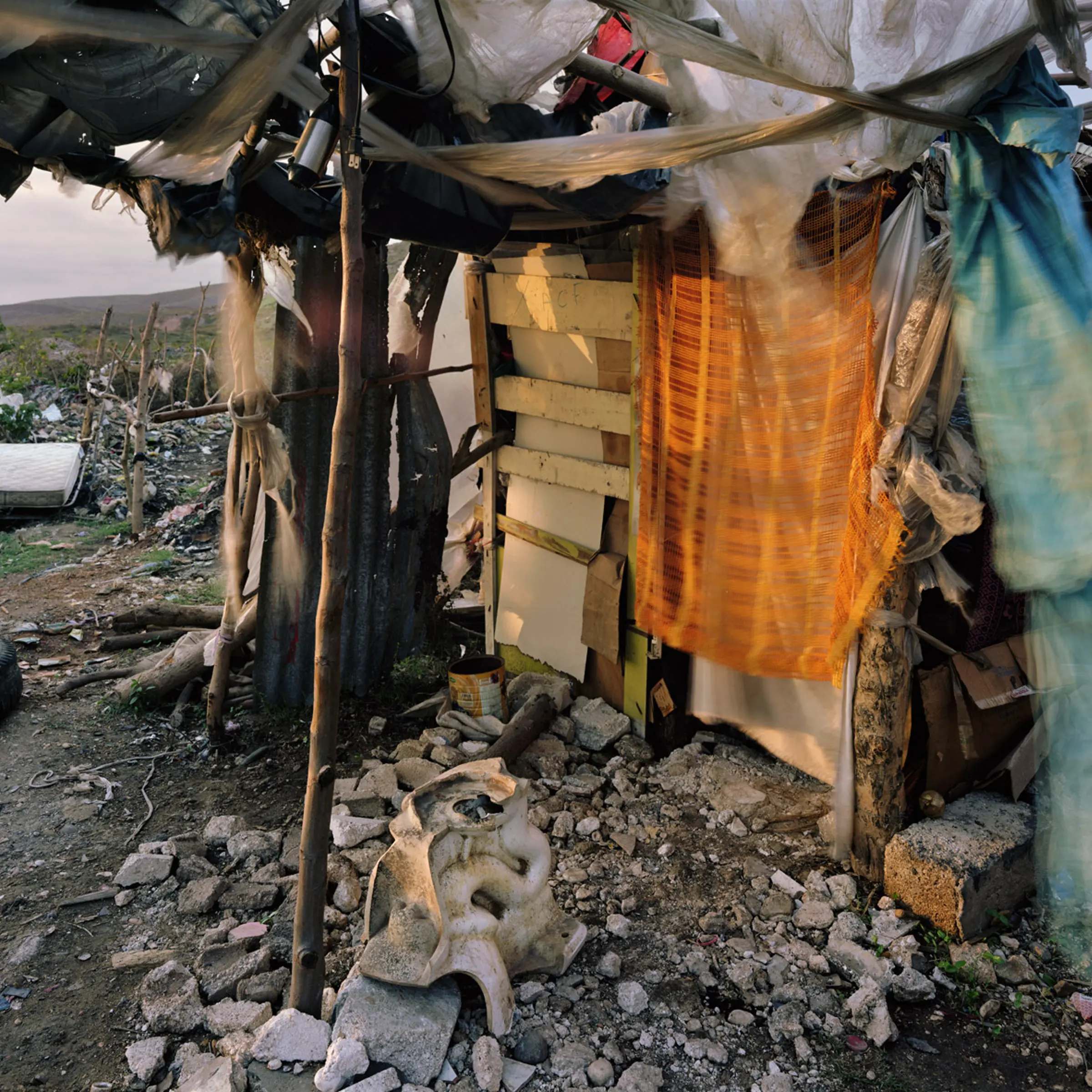 Camp Obama, home to approximately 10,000 people, was named to draw U.S. attention. Residents said they were often the target of raids by people who believed the camp received special treatment
