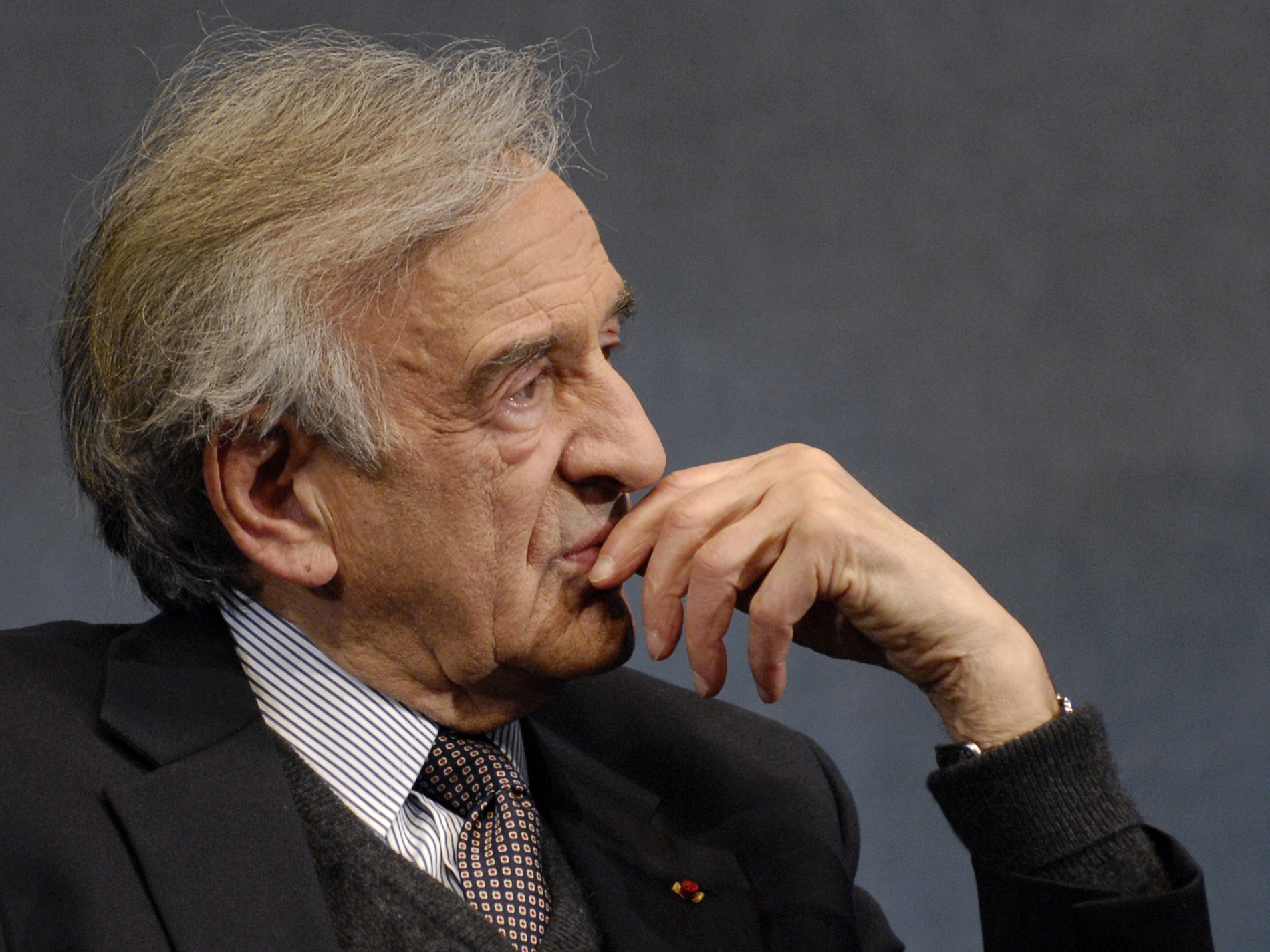 Elie Wiesel listens to a question posed by moderator Marvin Kalb during a program at the National Press Club in Washington, D.C., on Nov. 20, 2006.
