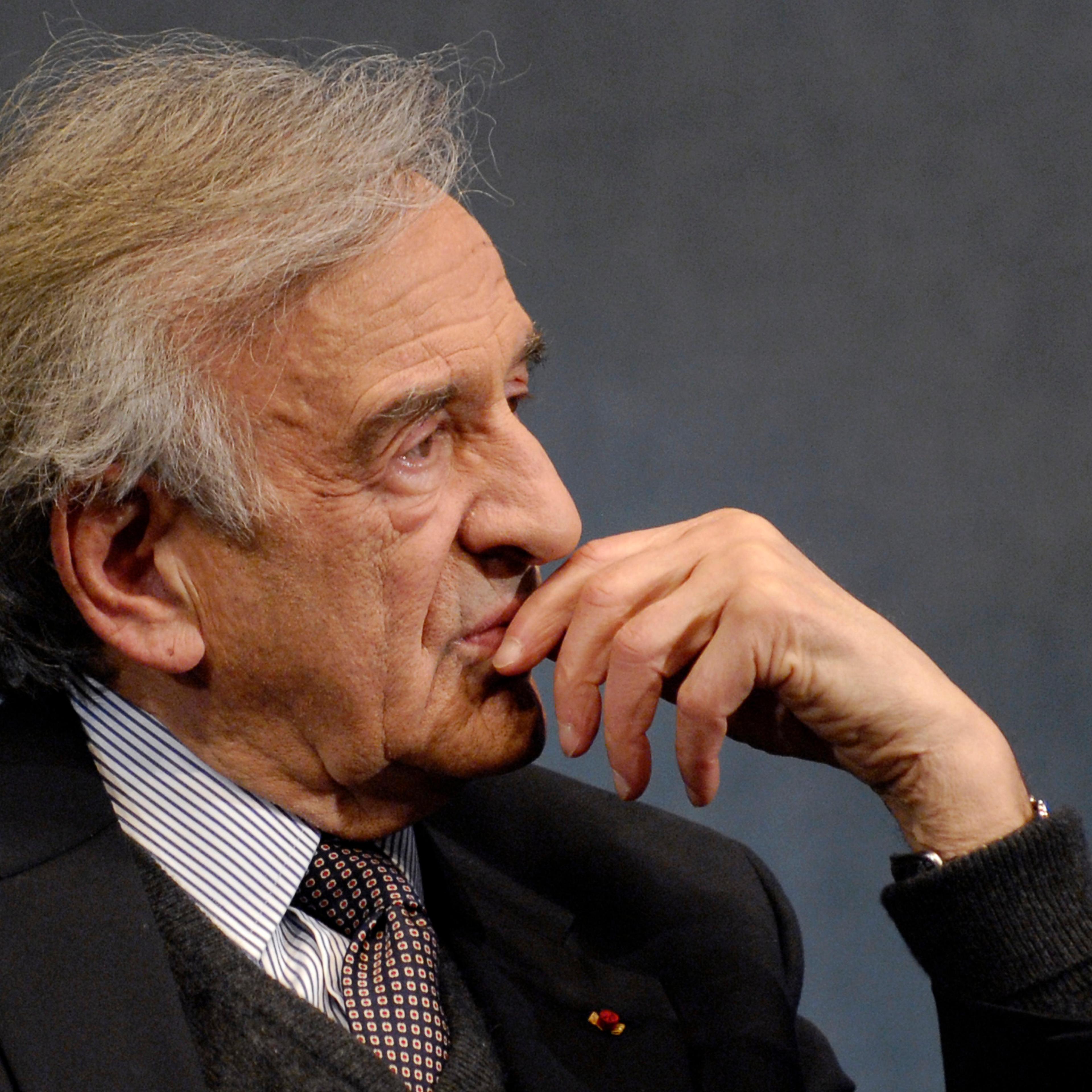 Elie Wiesel listens to a question posed by moderator Marvin Kalb during a program at the National Press Club in Washington, D.C., on Nov. 20, 2006.