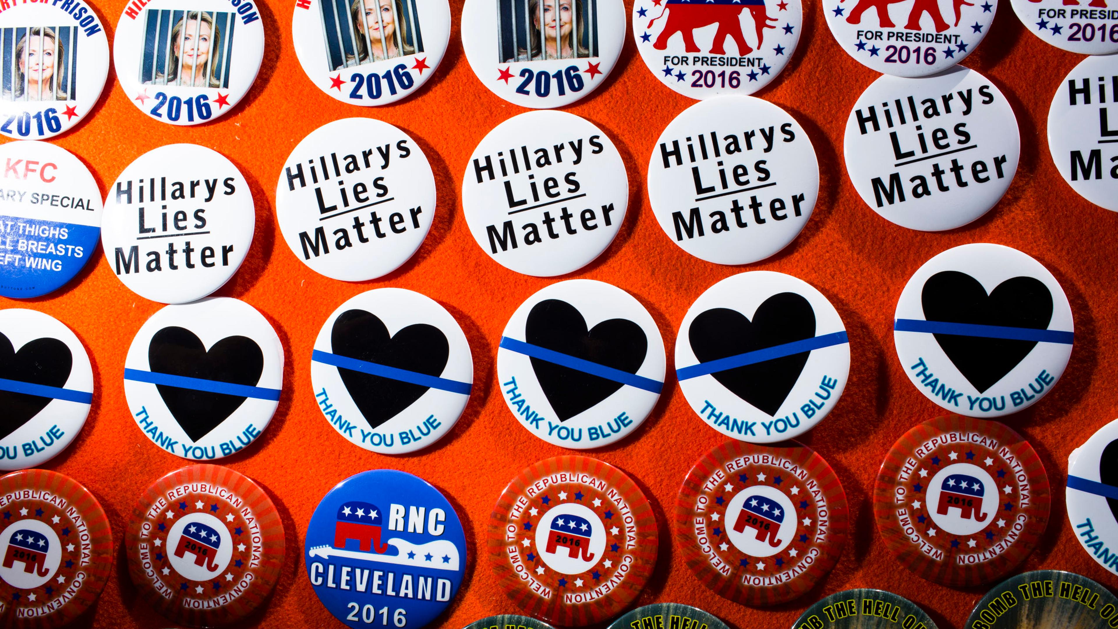 Buttons are displayed for sale outside the 2016 Republican National Convention in Cleveland on Tuesday, July 19, 2016.