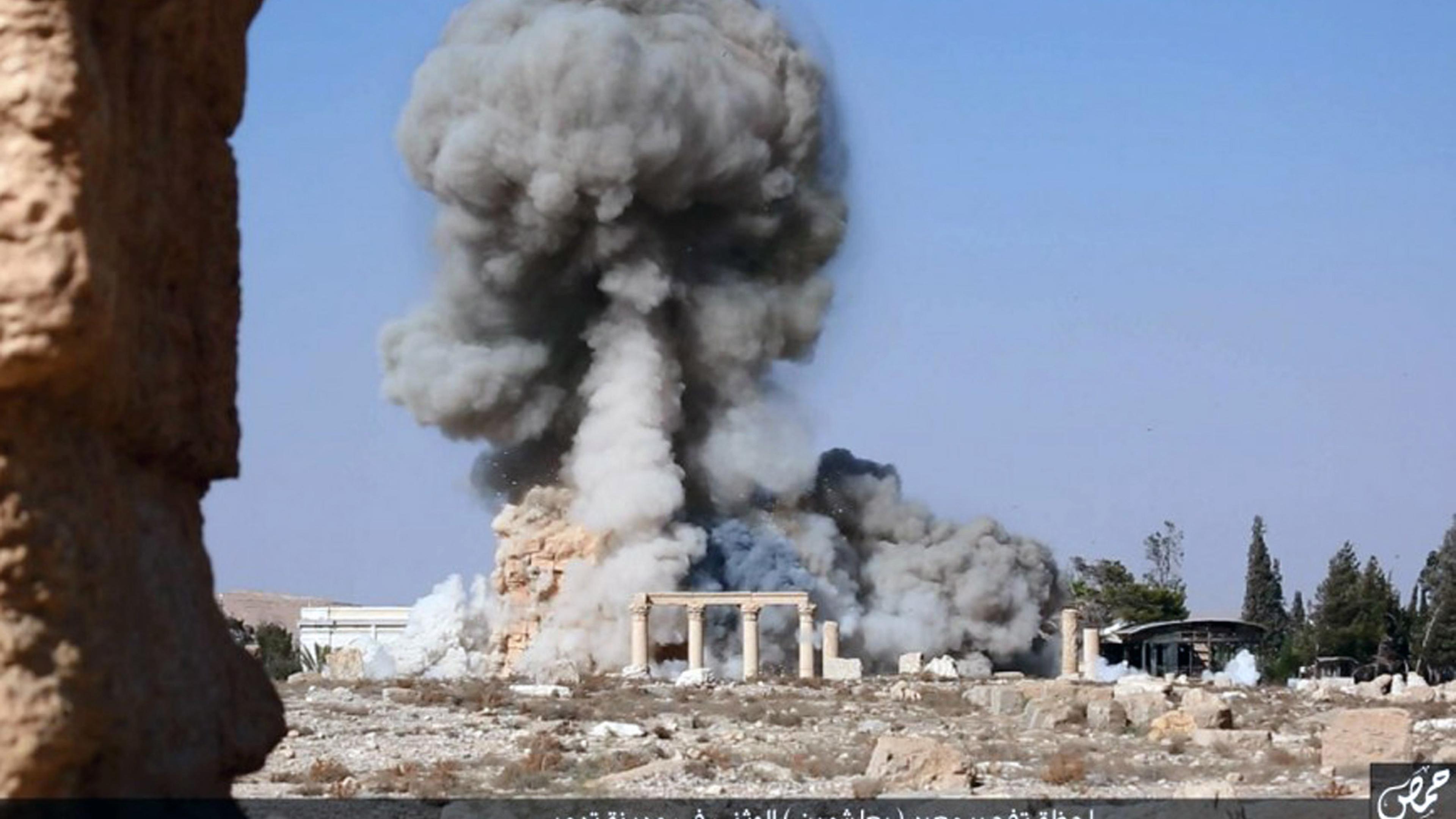 This undated photo released Tuesday, Aug. 25, 2015 on a social media site used by Islamic State militants, which has been verified and is consistent with other AP reporting, shows smoke from the detonation of the 2,000-year-old temple of Baalshamin in Sy