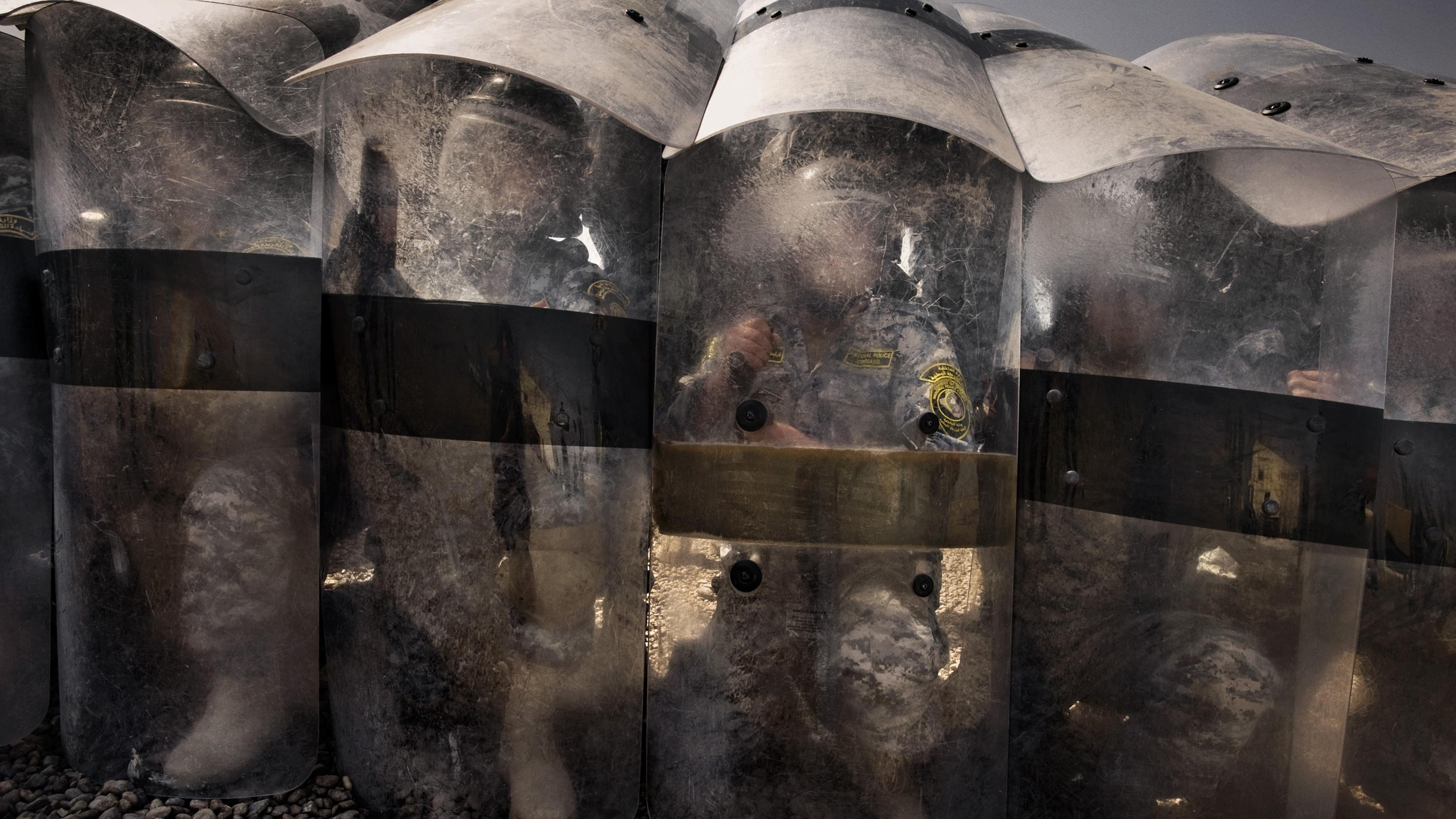 Iraqi policemen during a demonstration exercise for U.S. General Ray Odierno's visit at the training center at the Dublin camp in Baghdad, Iraq, March 4, 2009.