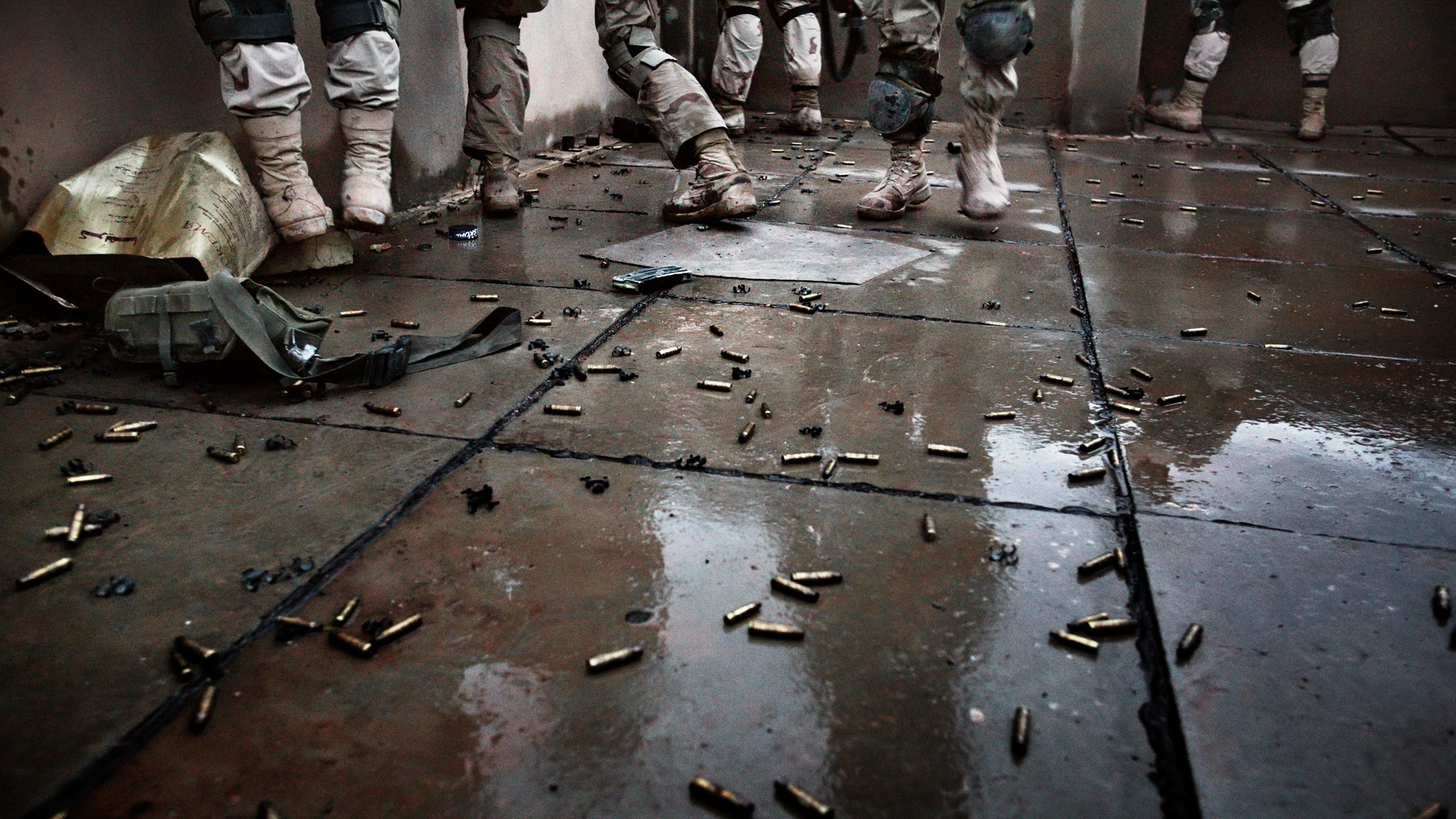 Shell casings line a rooftop where soldiers with the Army Task Force 2-2's Alpha Company, 3rd Platoon fight insurgents during a major offensive to clear the city of extremists, Fallujah, Nov. 9, 2004.