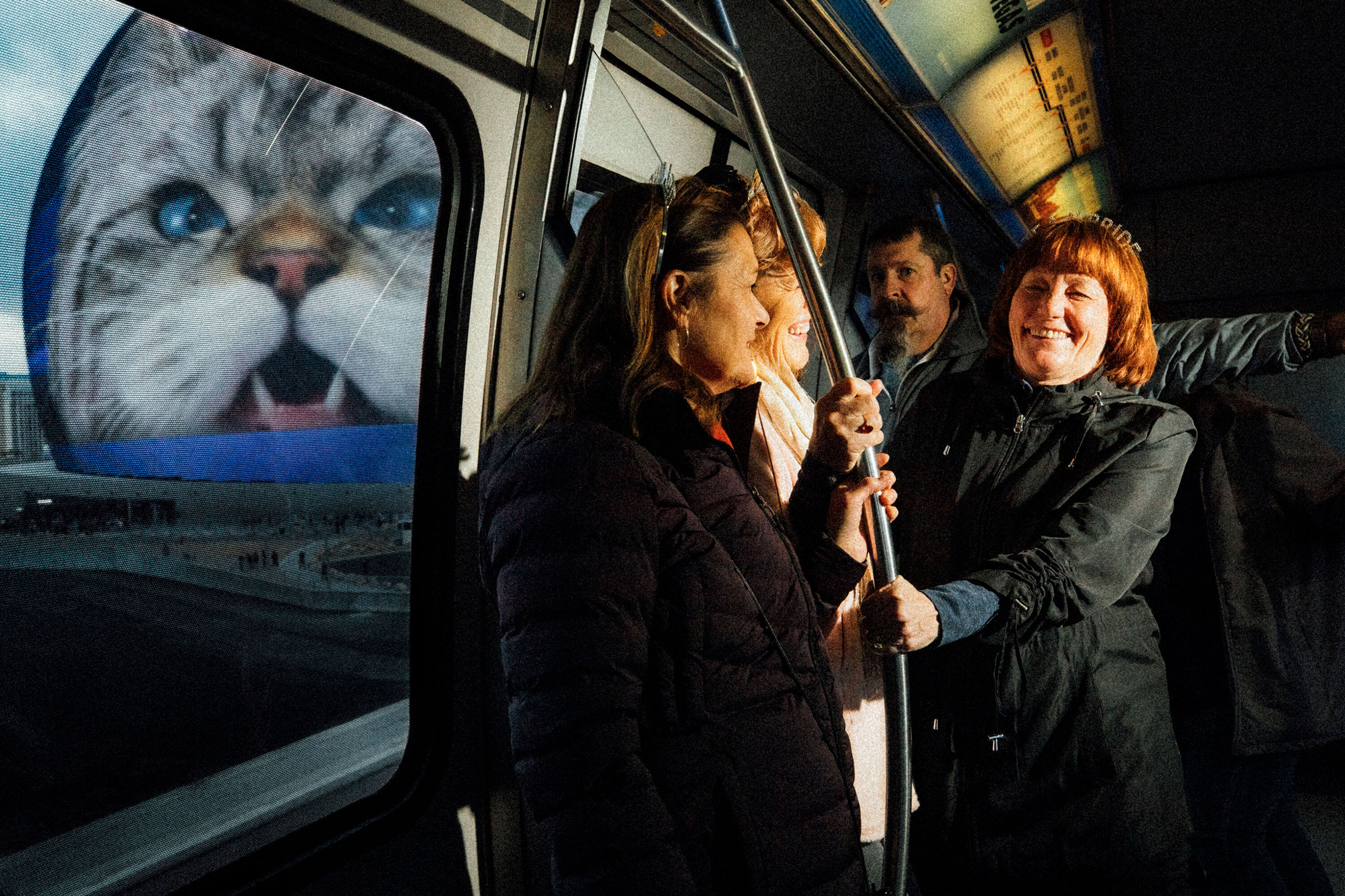 With the new Sphere visible through a window, friend on a bachelorette weekend ride the Monorail in Las Vegas, Feb. 4, 2024. (Sinna Nasseri/The New York Times)