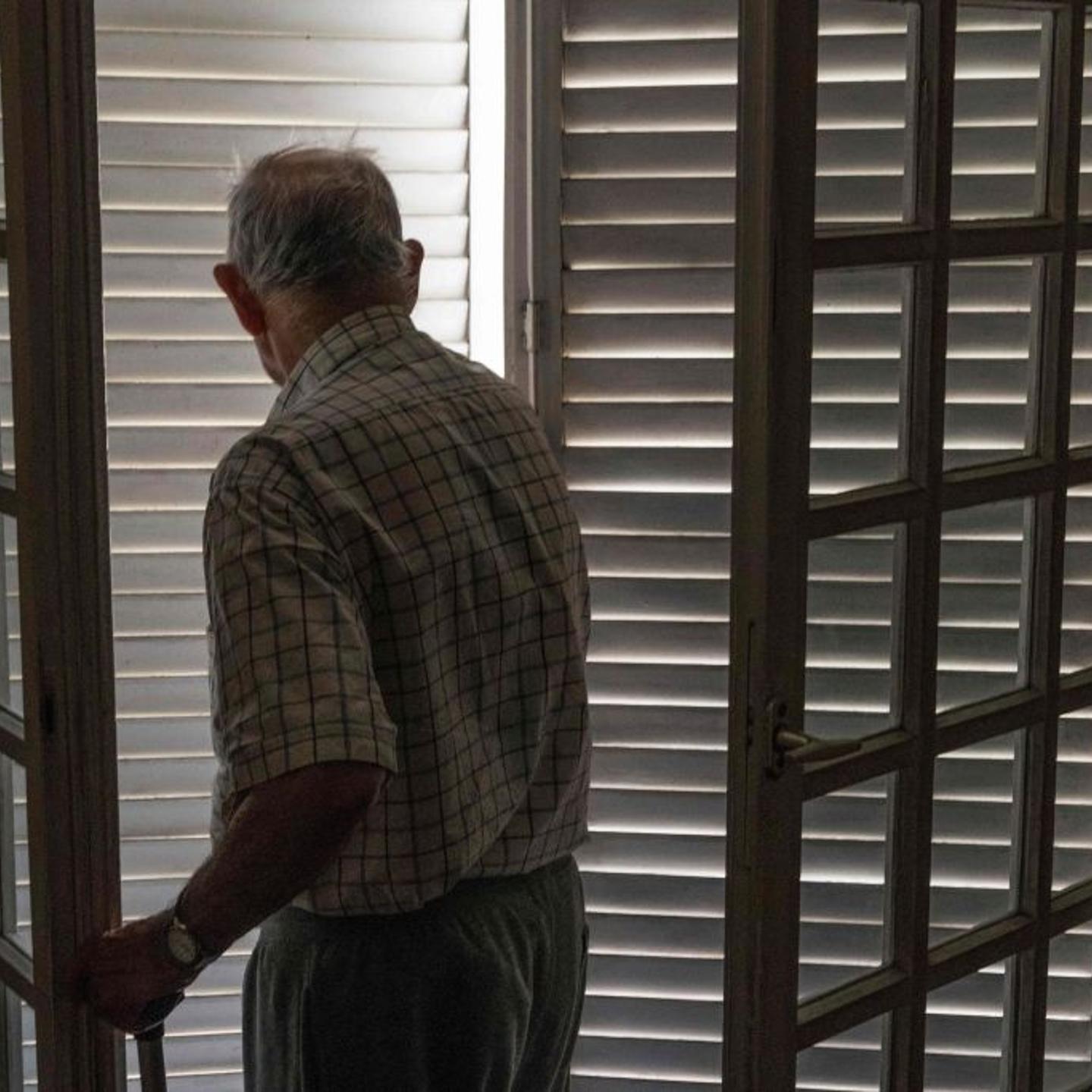 An elderly person closes his shutters to keep cool and to avoid heatstroke during the heatwave on June 25, 2019 in France.