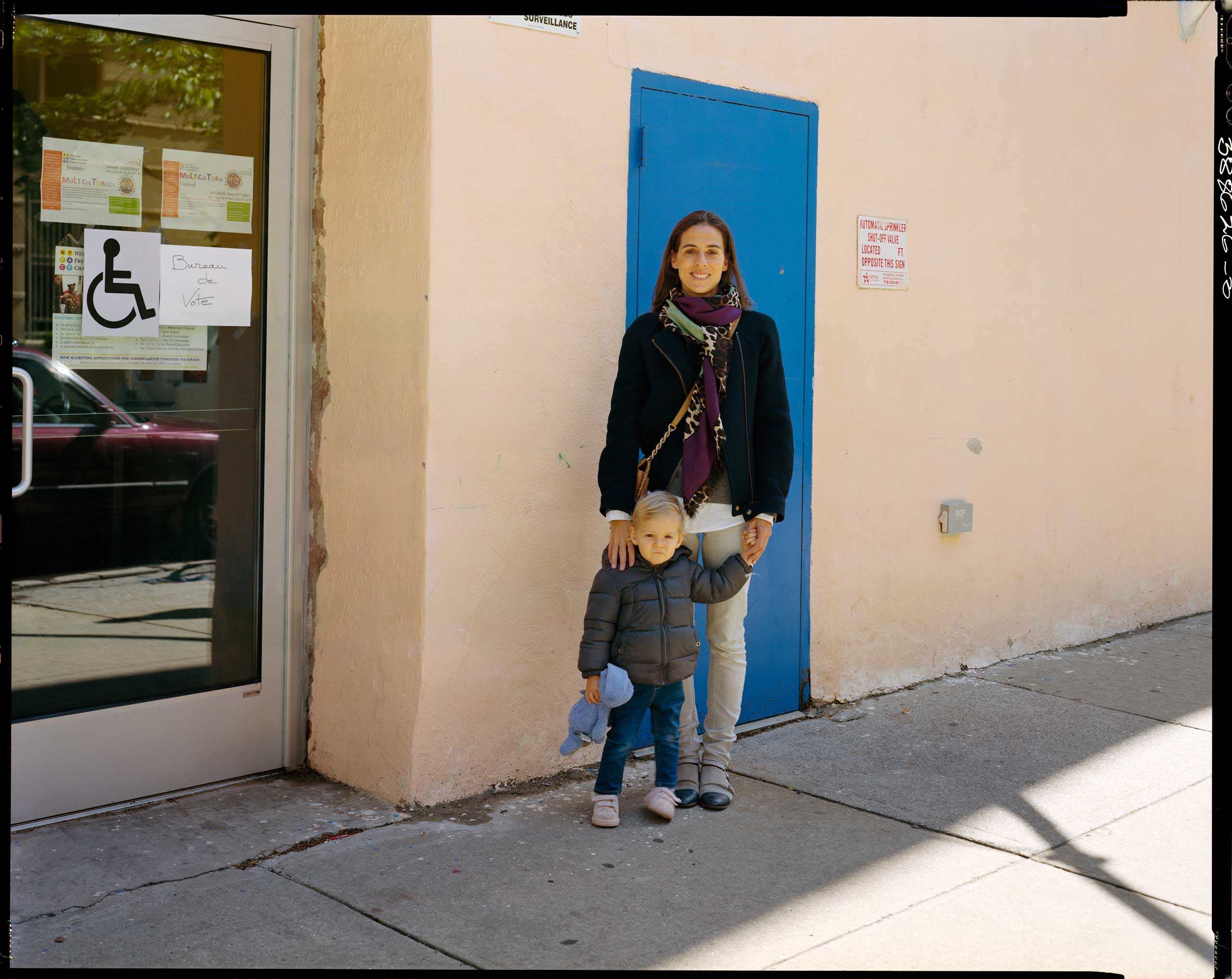 <b>Translation of caption from <i>Liberation:</i><b> May 6, 10:15 am, Harlem. Maïa Dibie, accompanied by her daughter Inna, voted this morning at the polling station of the French American Charter School, which offers bilingual education (half in French, half in English) in northern Manhattan. Maïa is director of an artist’s studio, she has lived here since 2003. Among the French voters of New York, Emmanuel Macron received 94.7% of the votes in the second round of the presidential elections.