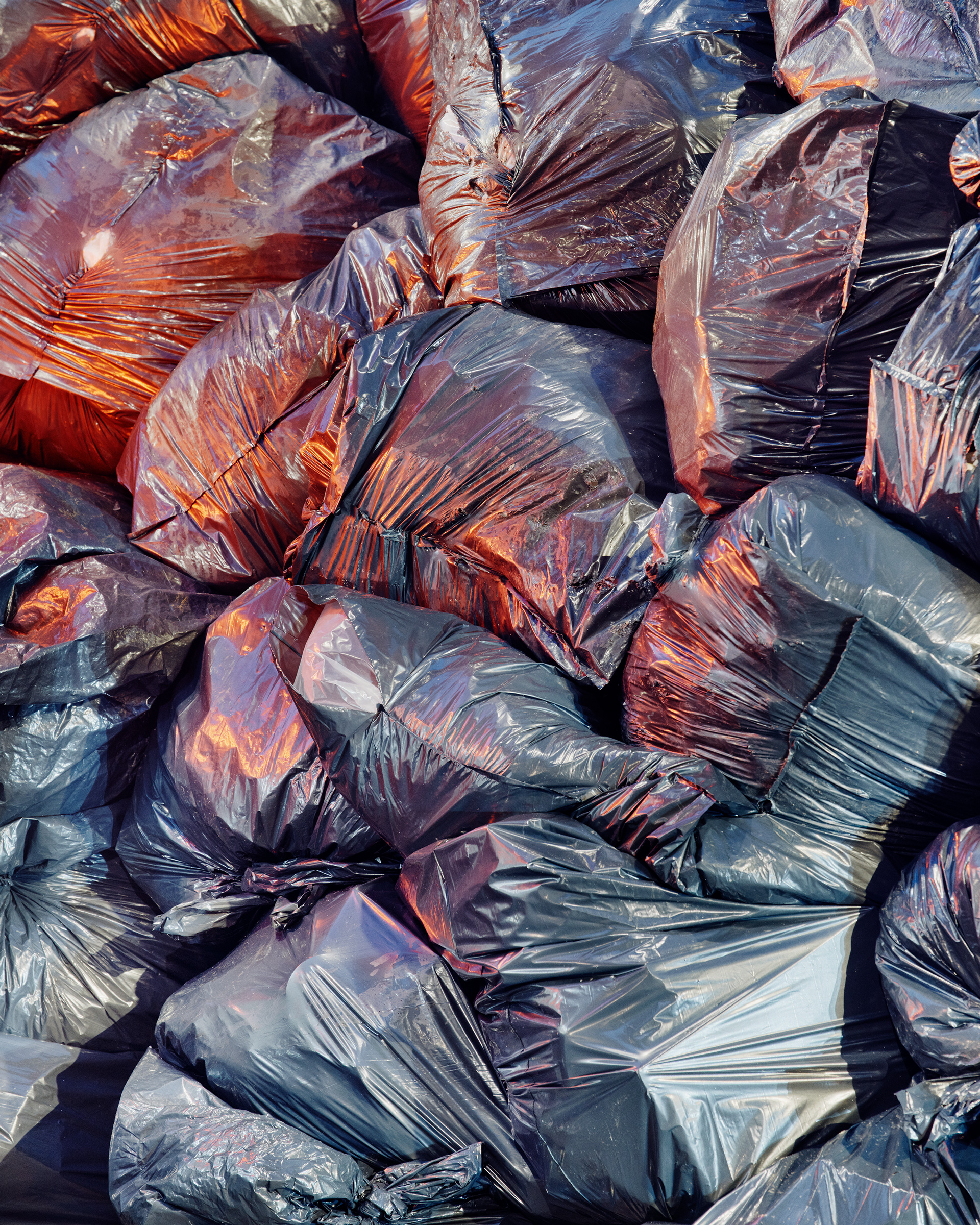 Trash bags pile up in Manhattan in January.