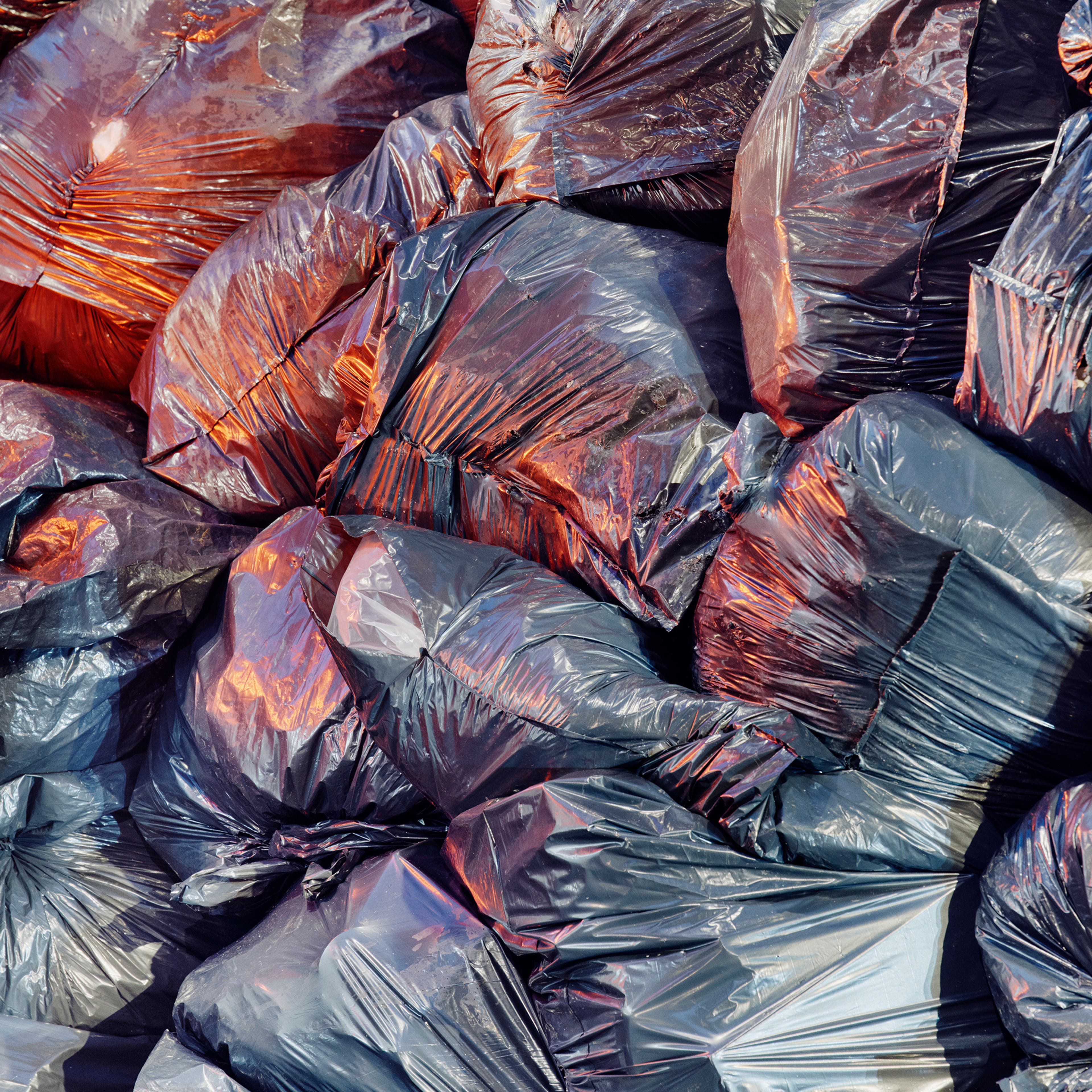 Trash bags pile up in Manhattan in January.