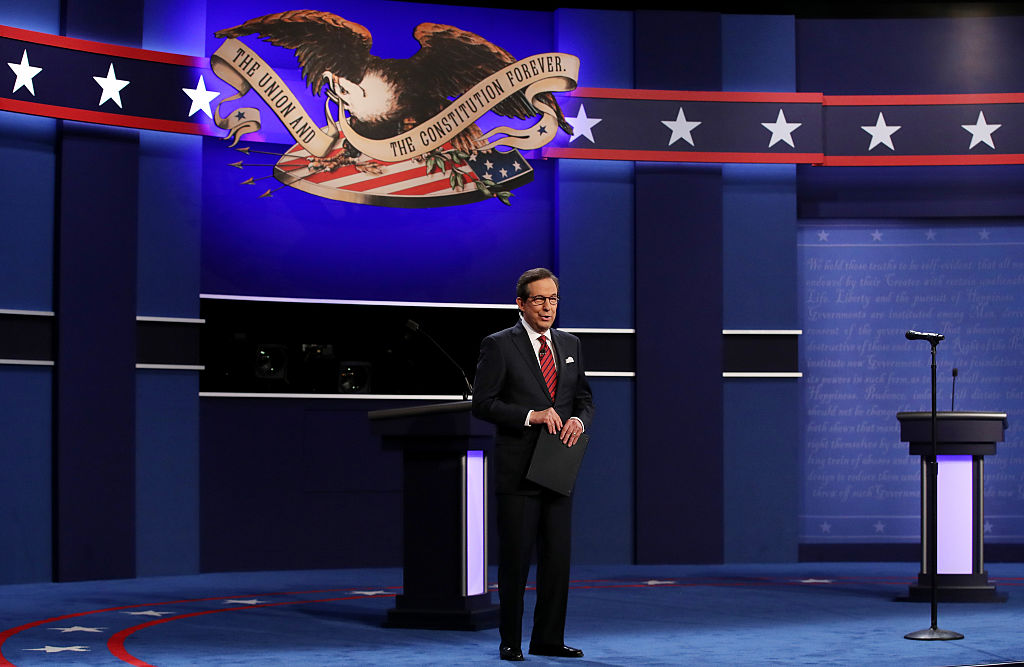 Fox News anchor and moderator Chris Wallace speaks to the guests and attendees during the third U.S. presidential debate