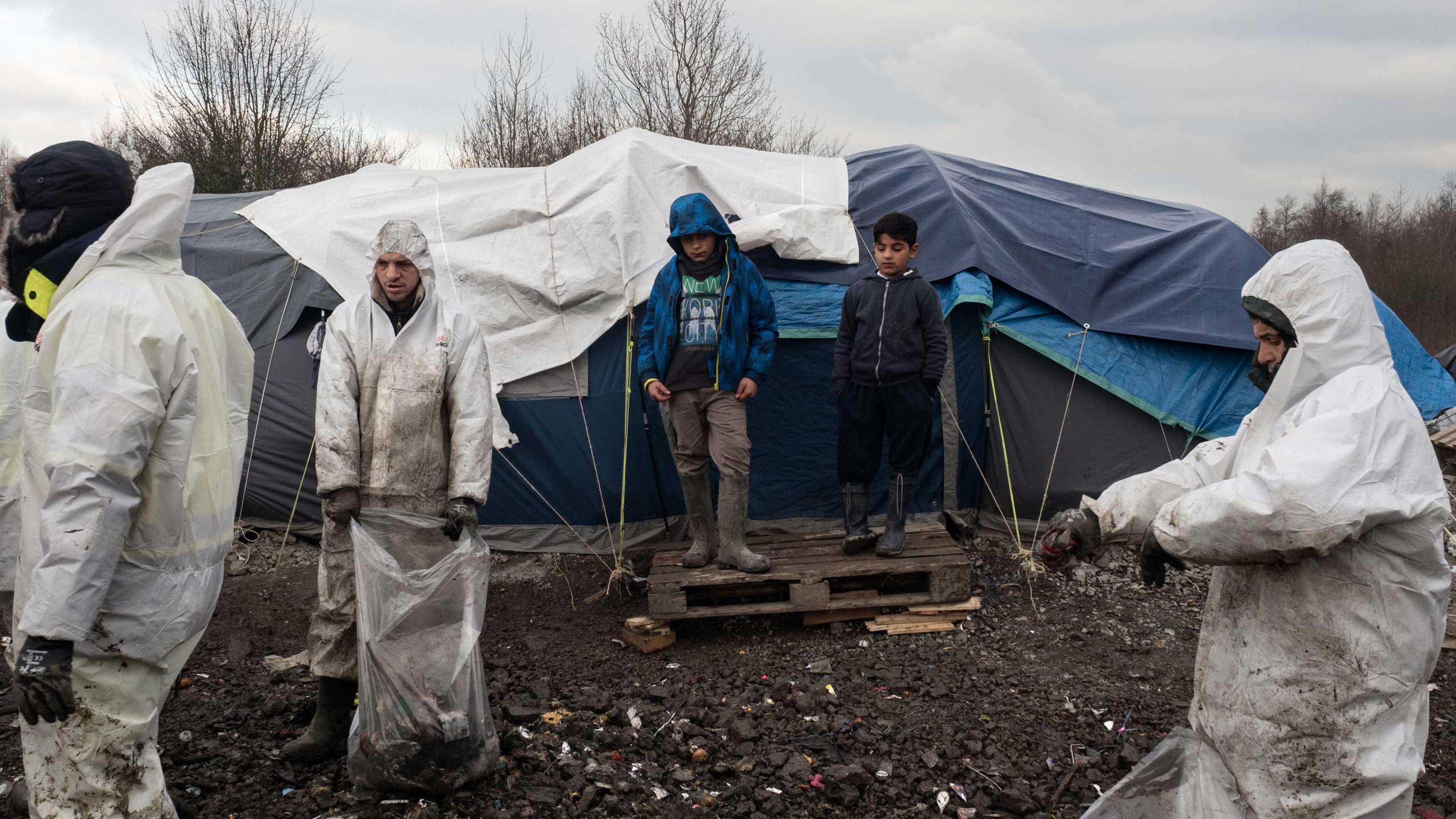 A group of workers from a private company have been hired to clean the trash left by the migrants in Grande-Synthe, the refugee camp near Dunkirk, which is accommodating over 2,500 refugees mostly families from Kurdistan, Jan.20, 2016.