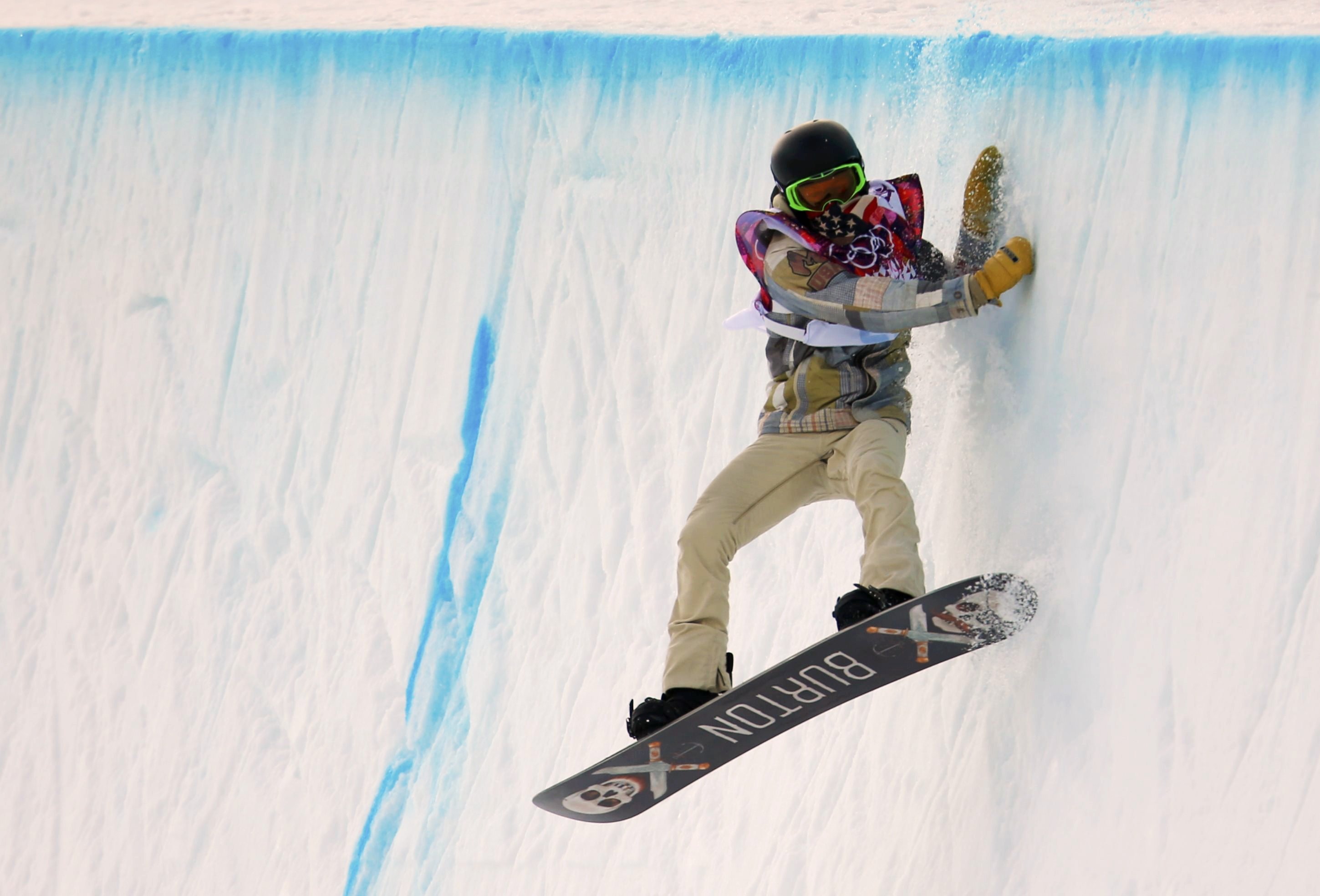 Shaun White of the U.S. competes during the men's snowboard halfpipe qualification round.