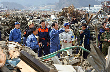 Before Rebuilding, Japan Faces Massive Clean Up