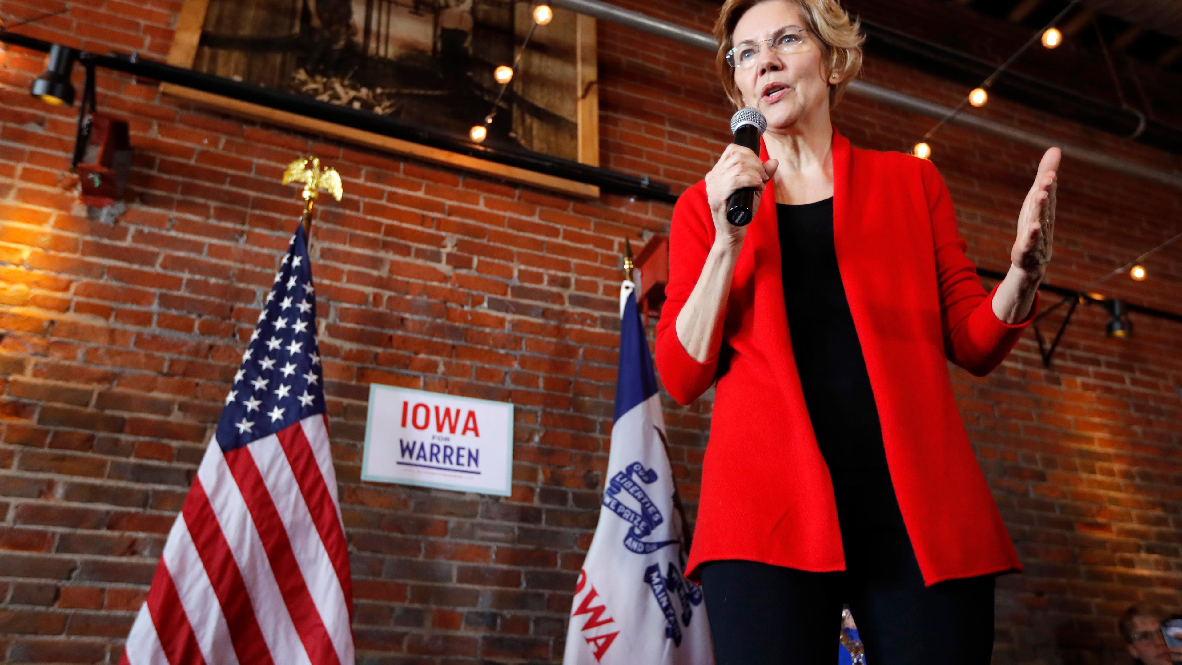 Democratic presidential candidate Sen. Elizabeth Warren speaks to local residents during an organizing event