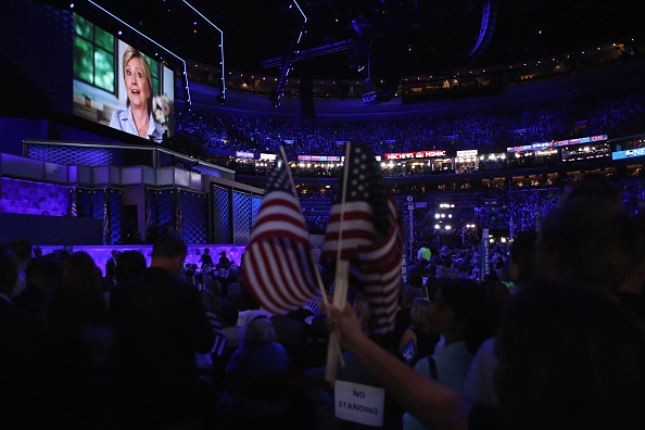 A video introdcuing Democratic presidential nominee Hillary Clinton is displayed on the fourth day of the Democratic National Convention at the Wells Fargo Center, July 28, 2016 in Philadelphia, Pennsylvania.