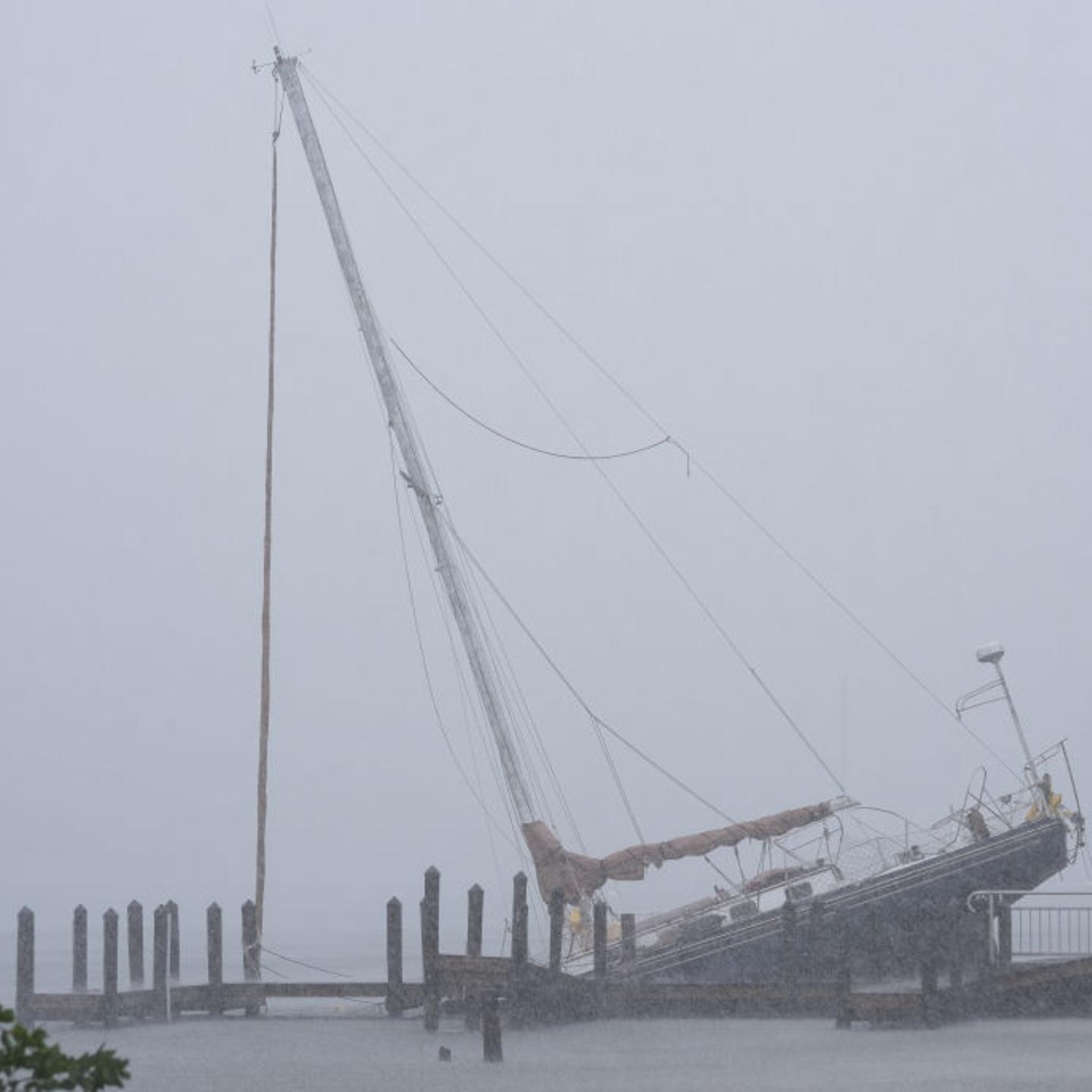 A boat struggles to stand still as Hurricane Milton bears down on the Gulf Coast in Sarasota, Fla. on Oct. 9, 2024.