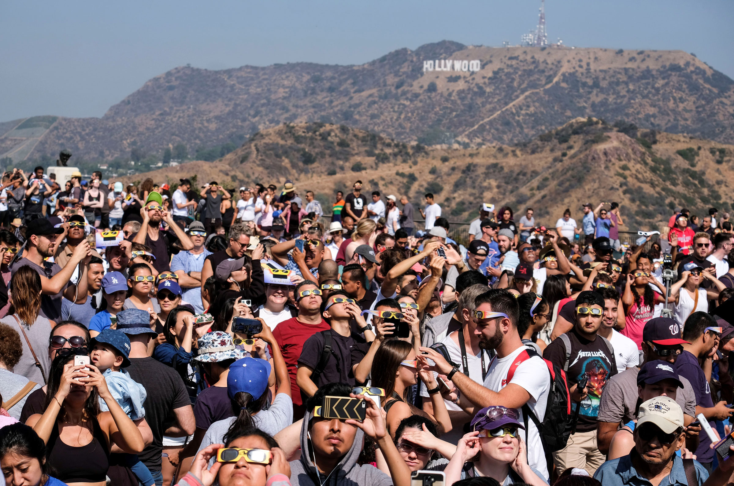 People attend a solar eclipse viewing event at the Griffith Observatory in Los Angeles, on Aug. 21, 2017.
