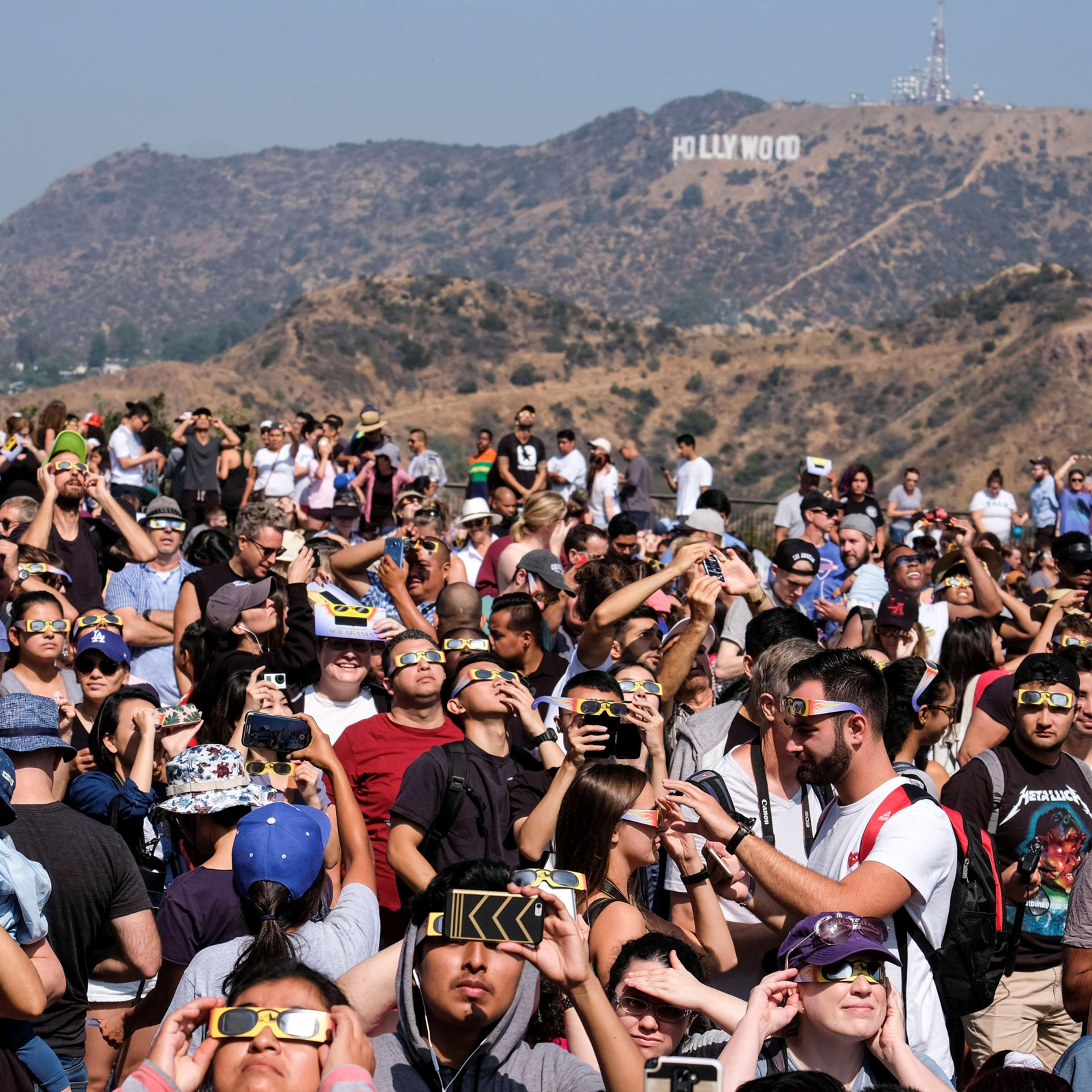 People attend a solar eclipse viewing event at the Griffith Observatory in Los Angeles, on Aug. 21, 2017.