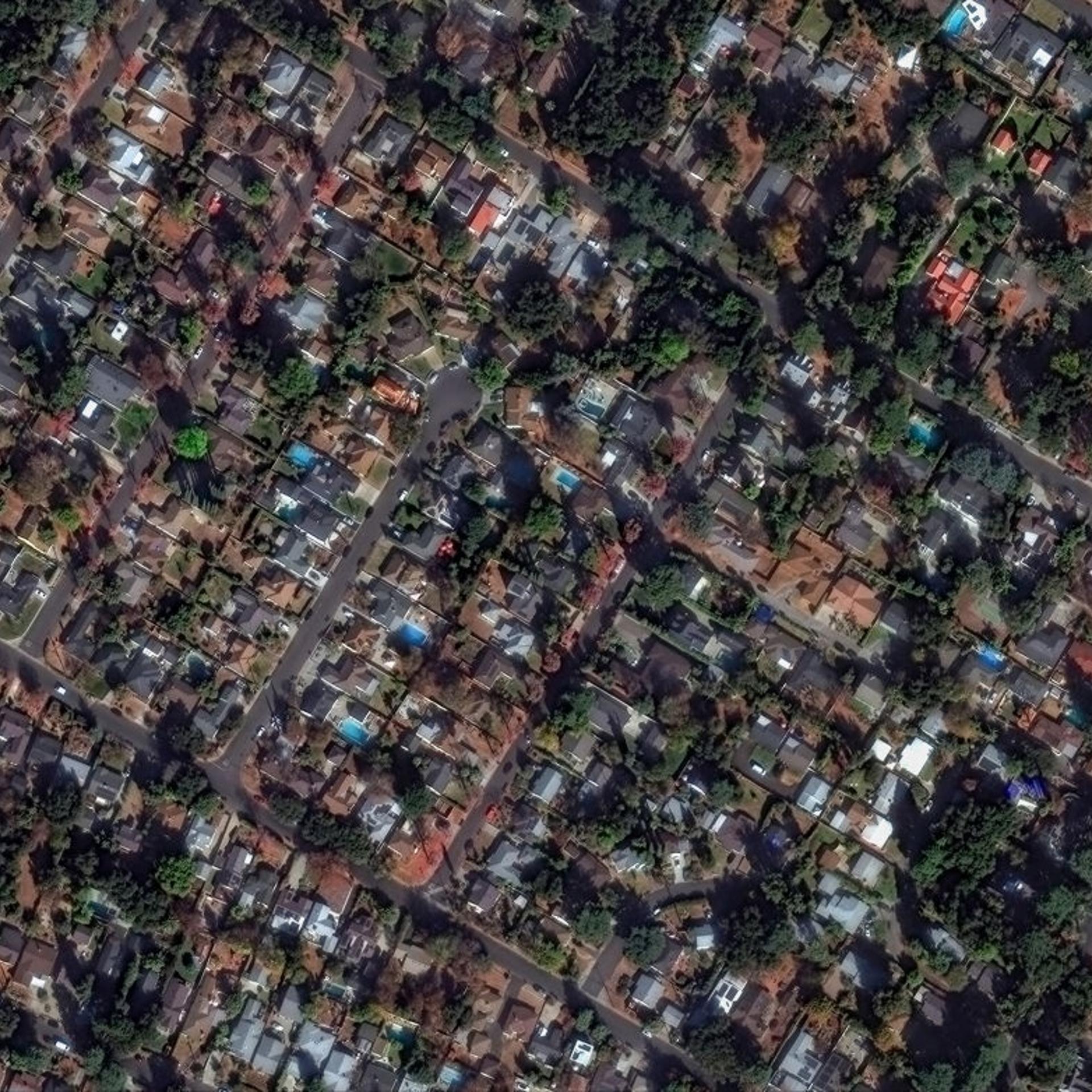 ALTADENA FIRE, LOS ANGELES, CALIFORNIA -- JANUARY 6,, 2025: Sequence image 13. Maxar BEFORE satellite image of homes and a neighborhood in Altadena, California. Please use: Satellite image (c) 2025 Maxar Technologies.