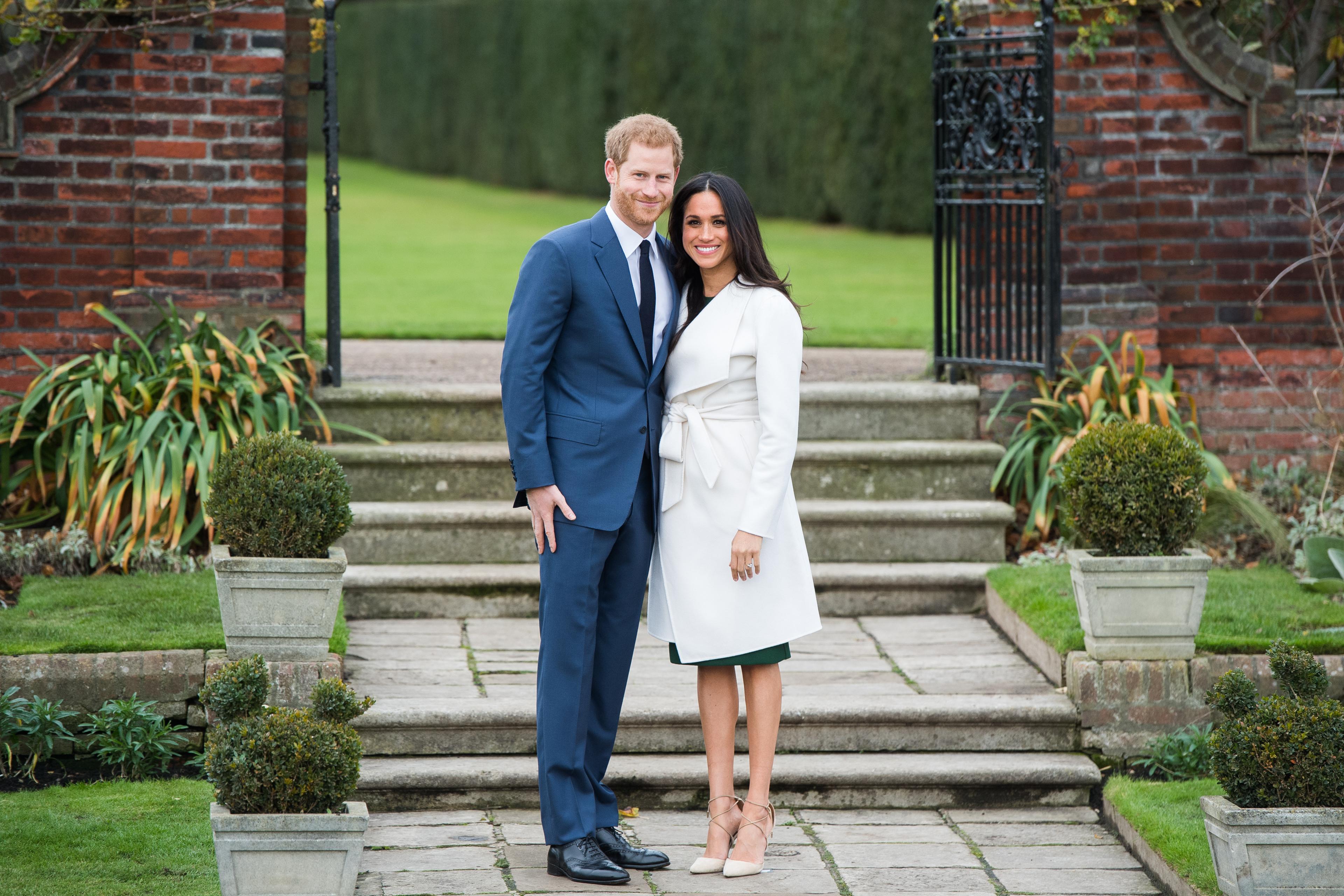 Meghan Markle Wears Line Label Coat For Engagement Photo Meghan Markle Wears Line Label Coat For Engagement Photo