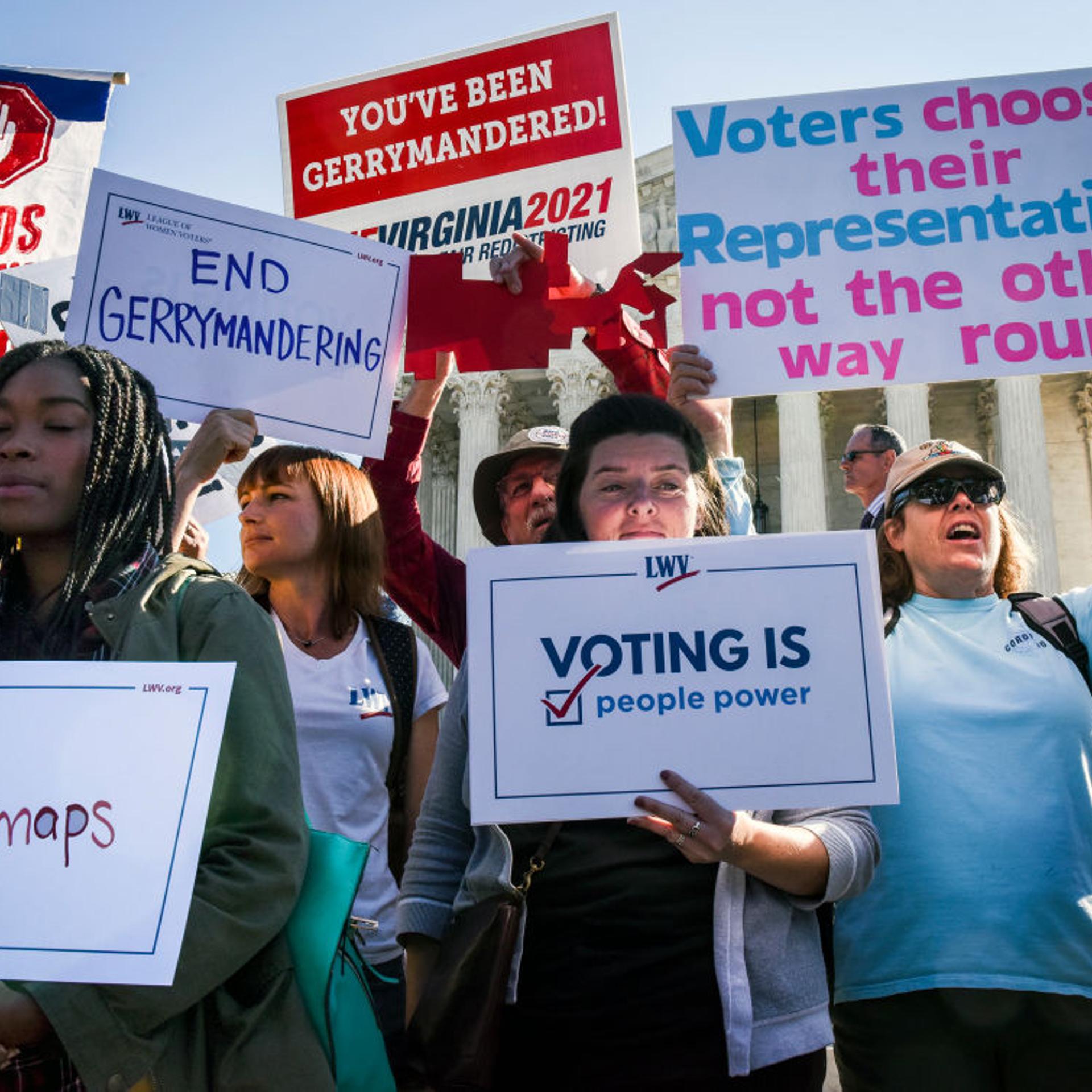Principals and protestors in front of the Supreme Court while the Justices hear arguments on gerrymandering, in Washington, DC.